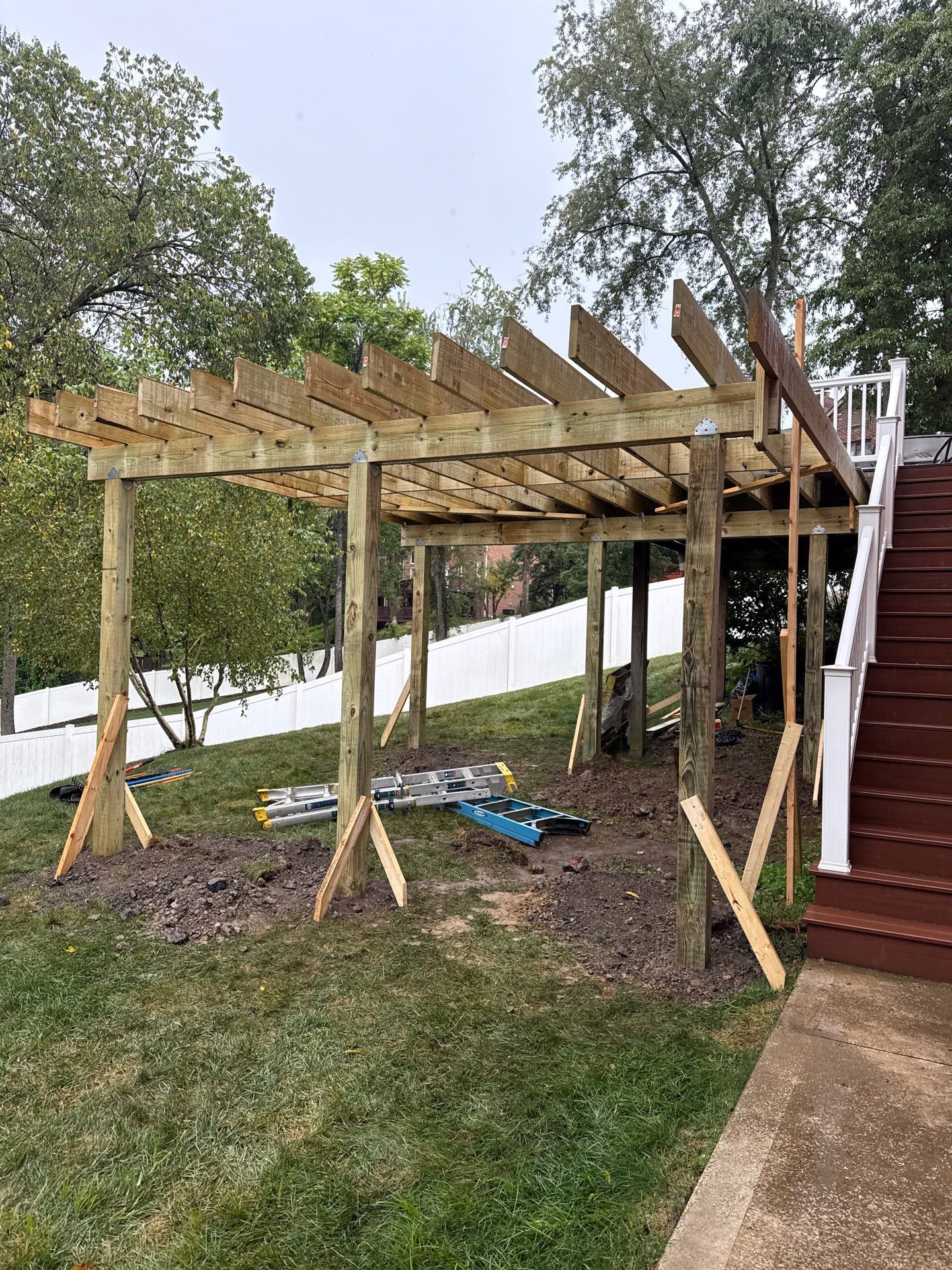 Deck extension  by Cousins Roofing Siding & Decks