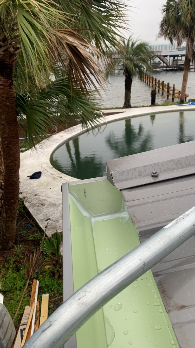 Seamless Gutter Installation using Charcoal Grey Gutters by Gutter Professors