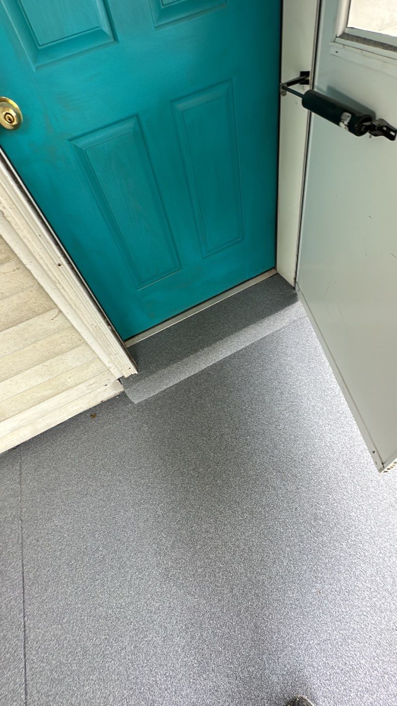 Basement + Porch Project in Clinton by Floors in a Day, Inc