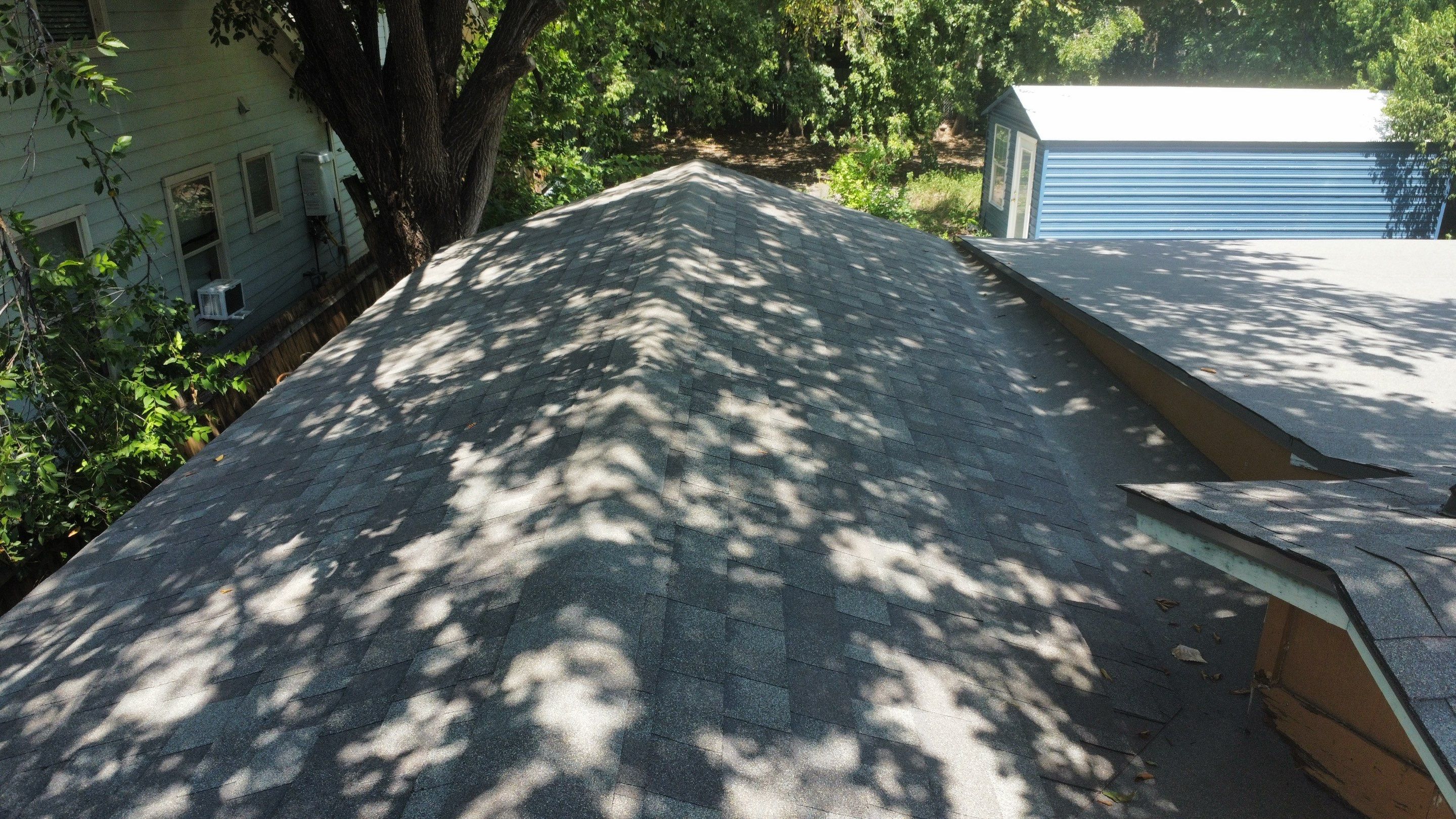 Mixed Roof System – Oakridge Driftwood + Flat Roof Section | Austin, TX by Kstylez Roofing & Construction
