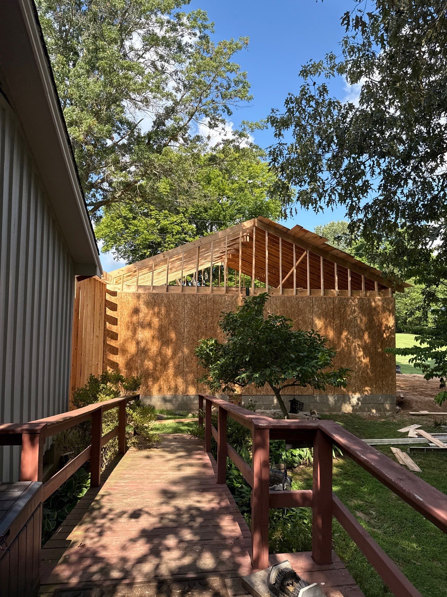 Sunroom and Garage Addition by Skilled Construction LLC