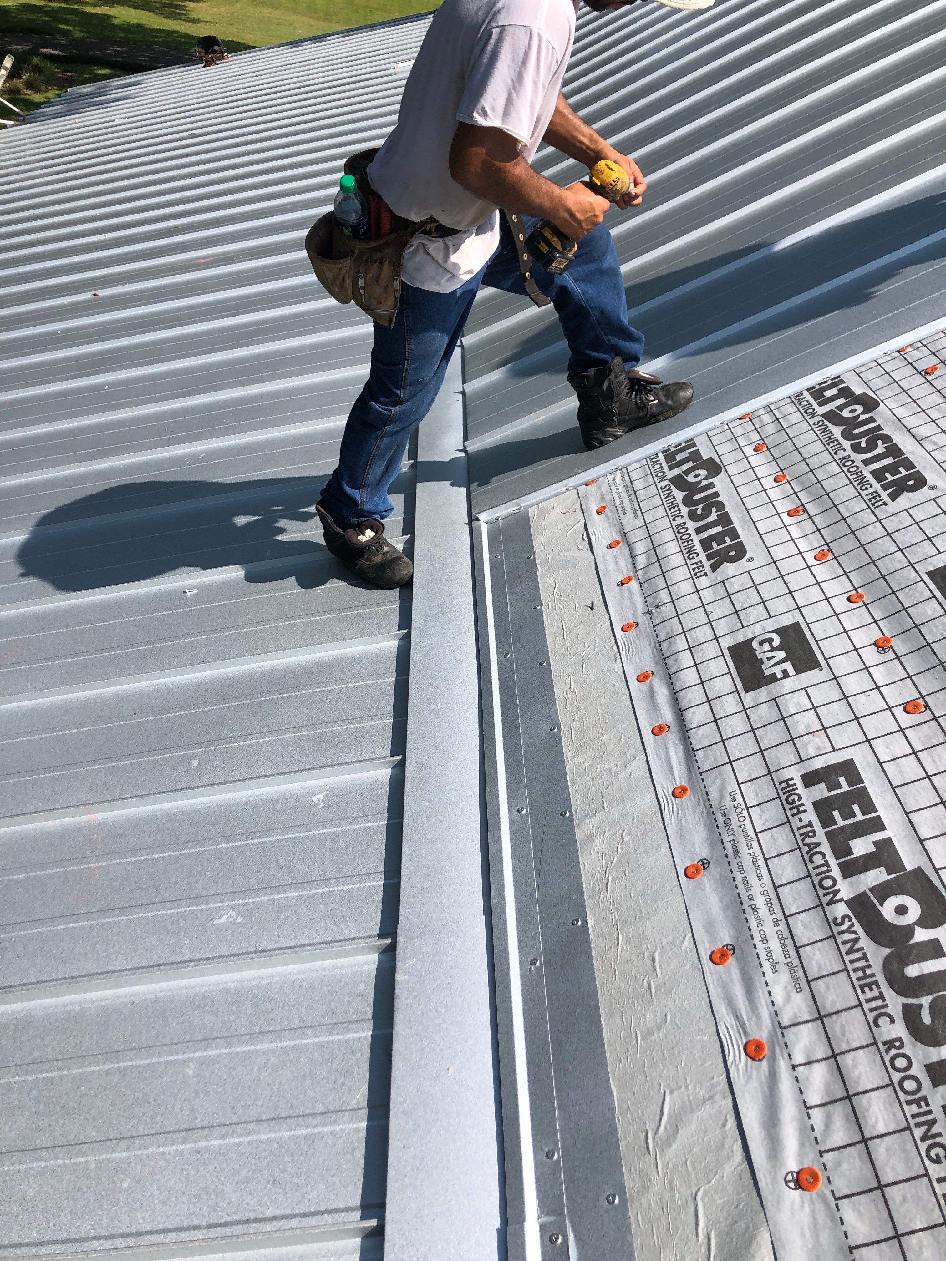 Residential Roofing Installation using Metal roofing by American Roofing & Construction LLC
