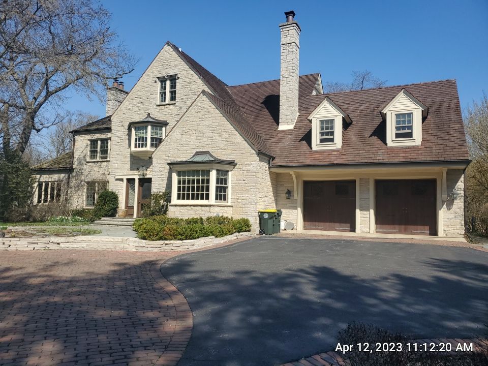 Winnetka, IL bluestone patio cleaning by Northern Power Washing LLC.
