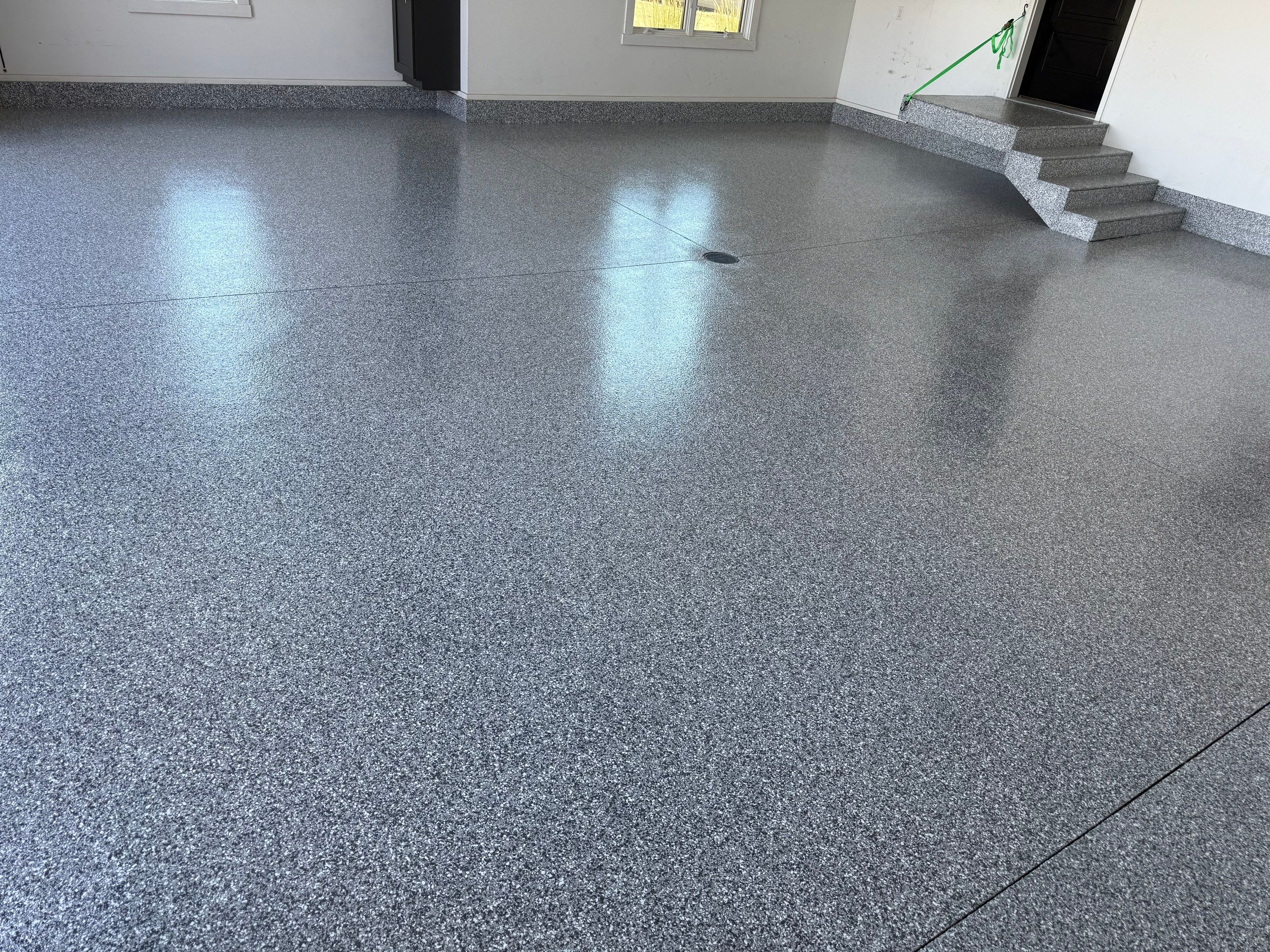 Gravel Flake Garage Floor Coating in Yankton by Select Painting, Coatings & Garage Cabinets