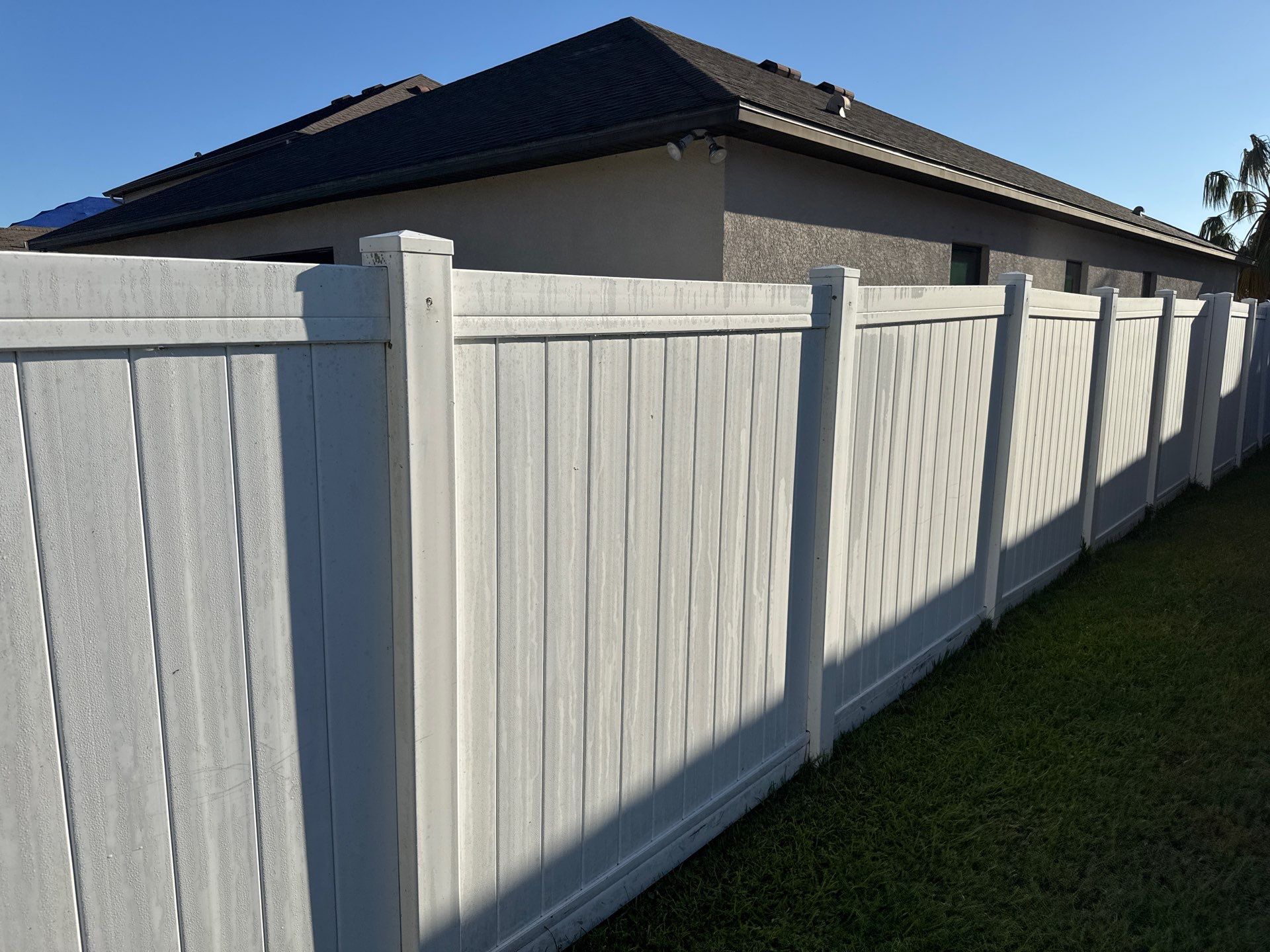 Comprehensive Concrete and Vinyl Fence Cleaning in Willow Walk Community, Palmetto, FL by Sunshine AquaWash