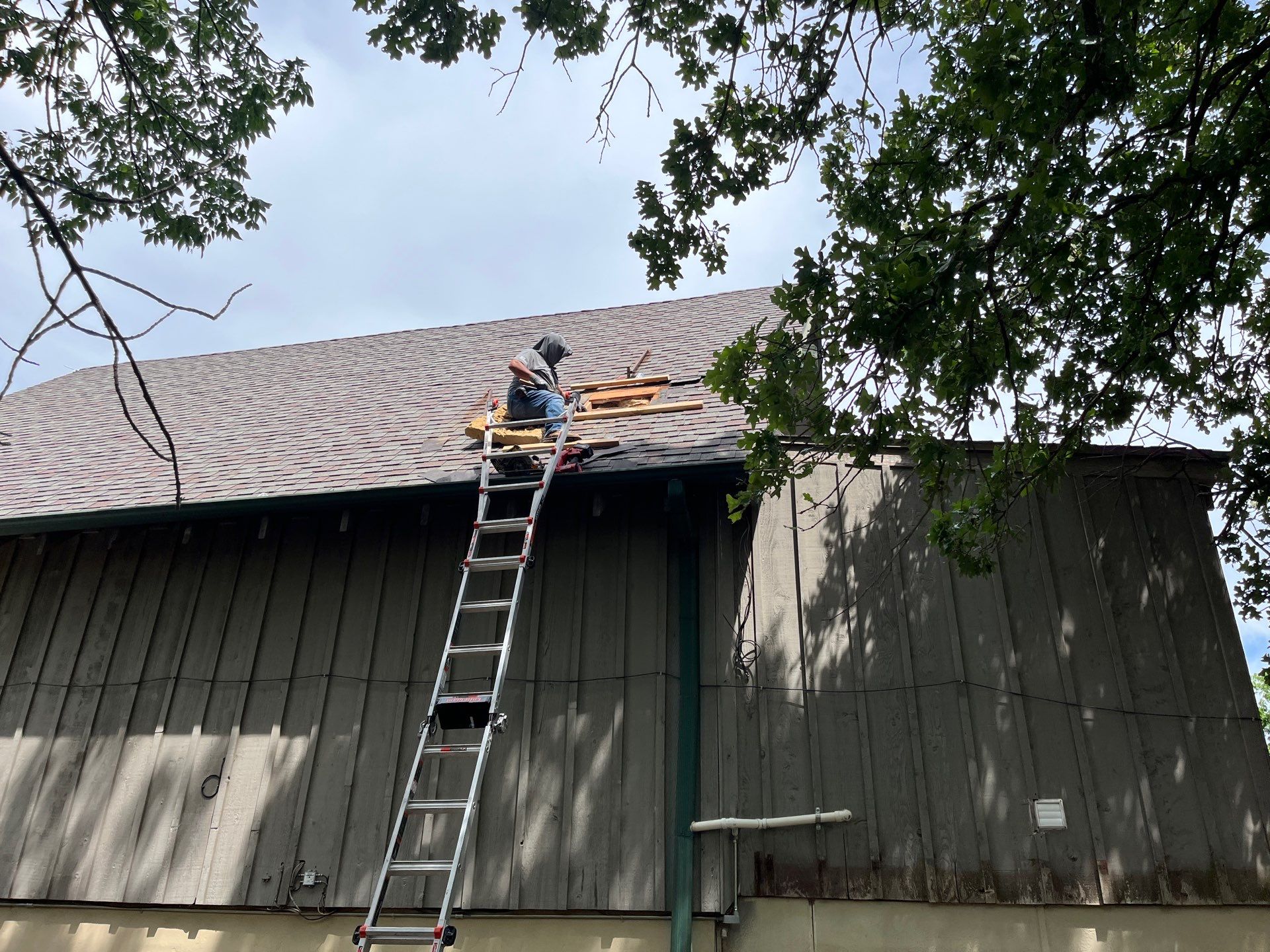 Architectural Shingle Roof Replacement and Skylight Installation in Sulphur by BANA Roofing and Solar Supply