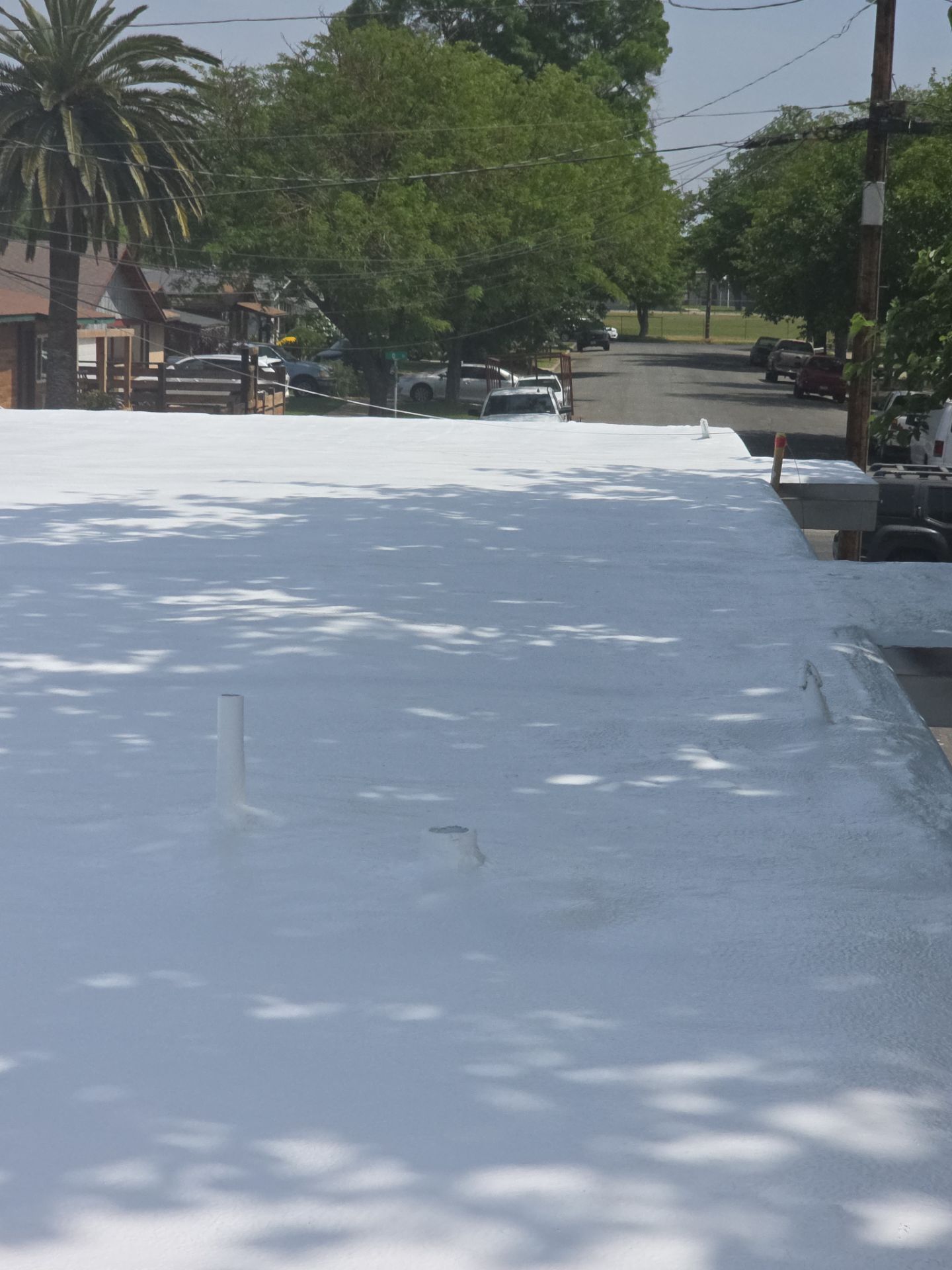 Foam Refurbish using Conklin Benchmark/PUMA XL coatings and spray foam by Straight Edge Roofing Inc