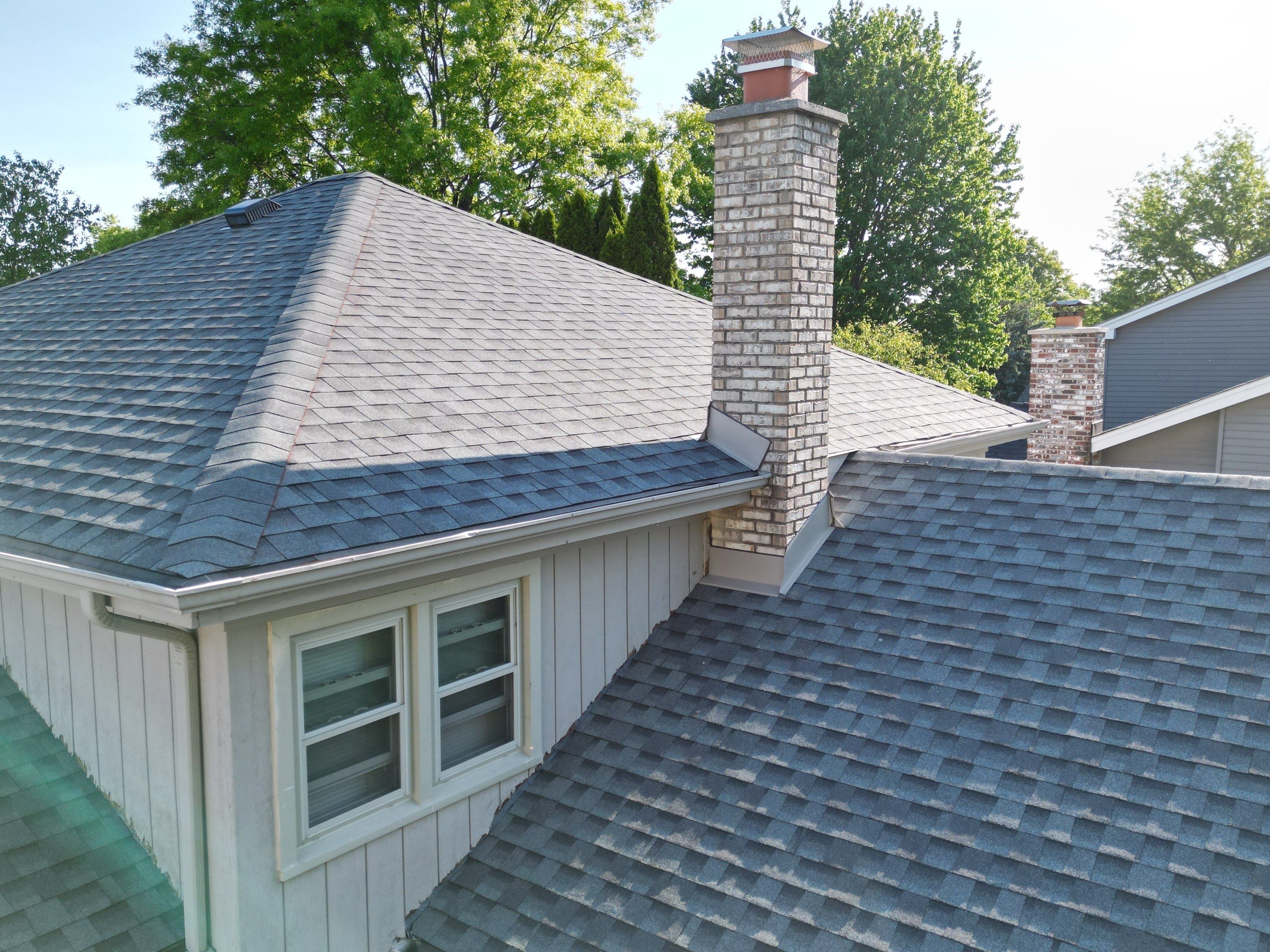Roof, gutters and siding by Optimal Home Improvement 