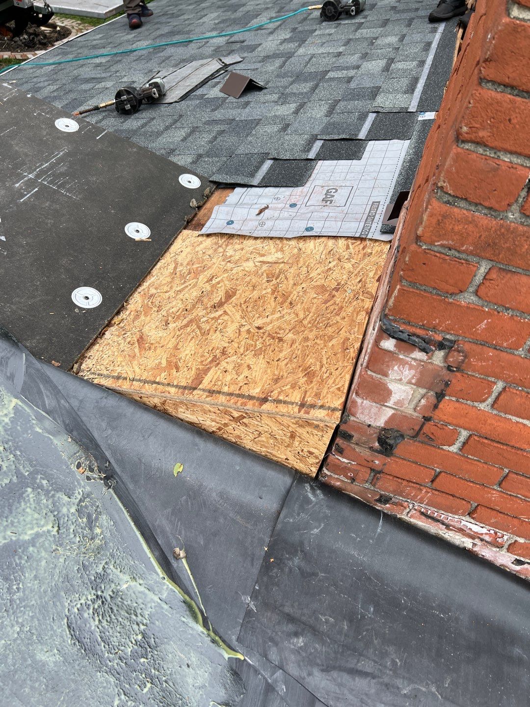 Residential Roofing Installation using 60 mil rubber roof  by Nitro Roofing and Construction