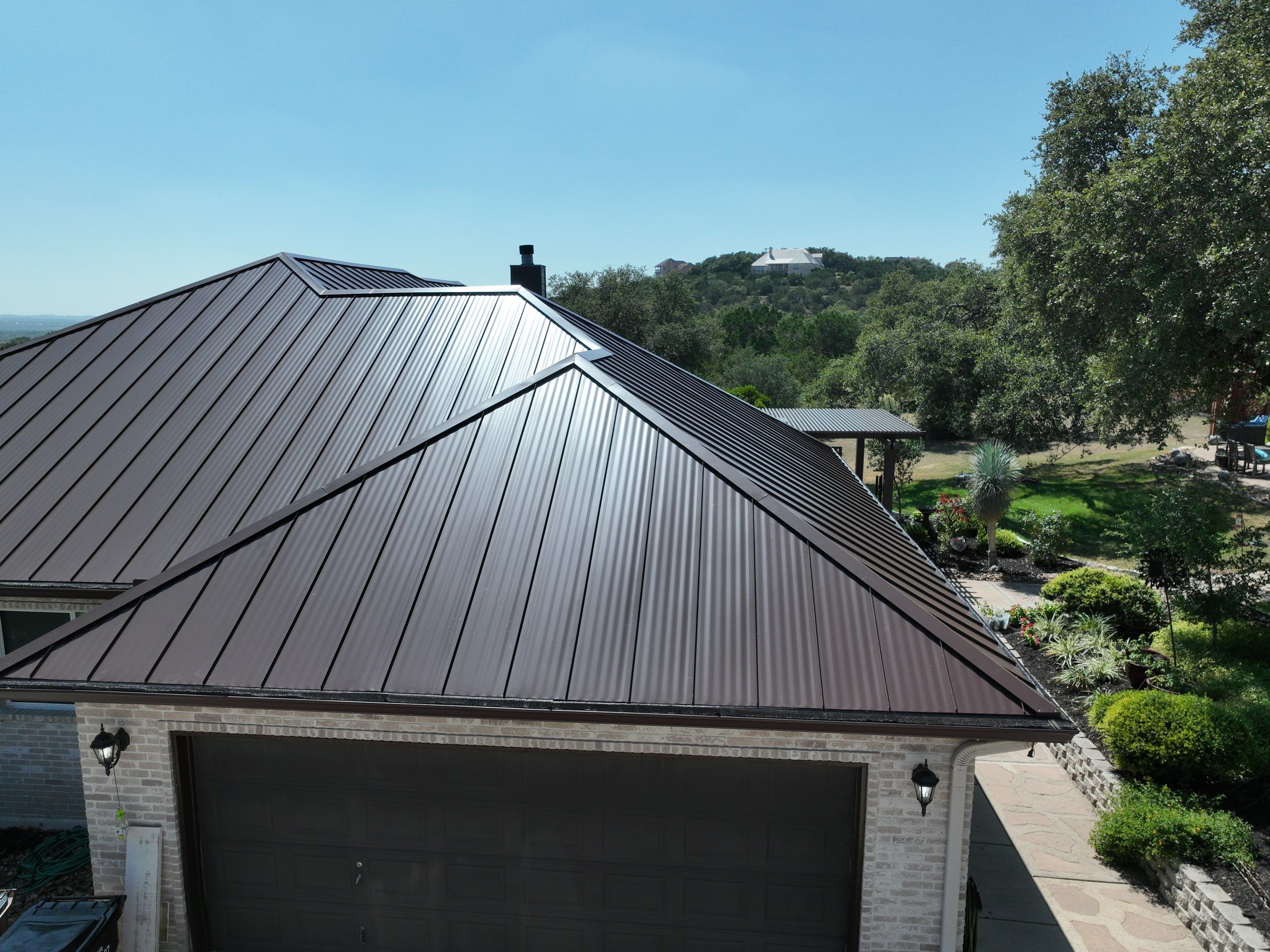 Residential Metal Roof Installation using McElroy Metal by Premier Roofing and Contracting