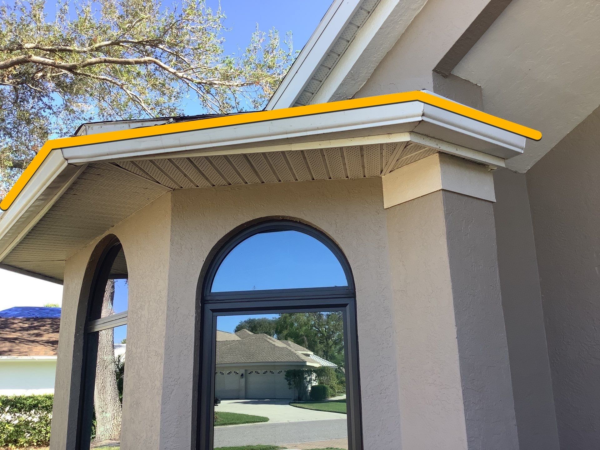 Black Seamless Gutters in Sarasota FL by Gutter Professors