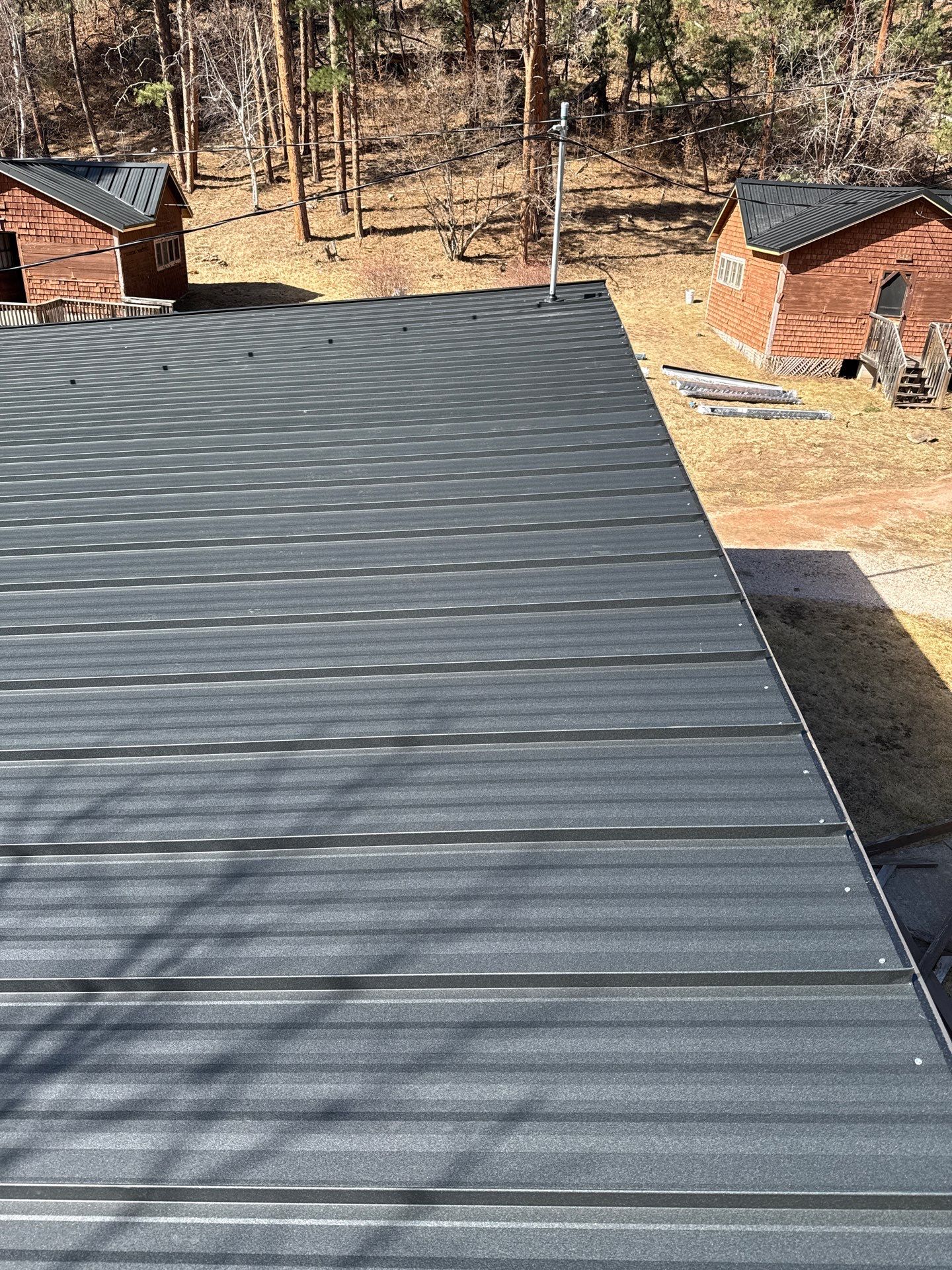 Residential Roofing Installation using Steel Roofing by Weather-Tite Exteriors LLC