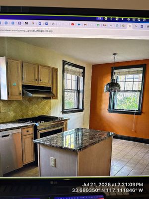 Lincoln Kitchen Remodel with Natural Wood Cabinets and Granite Countertops