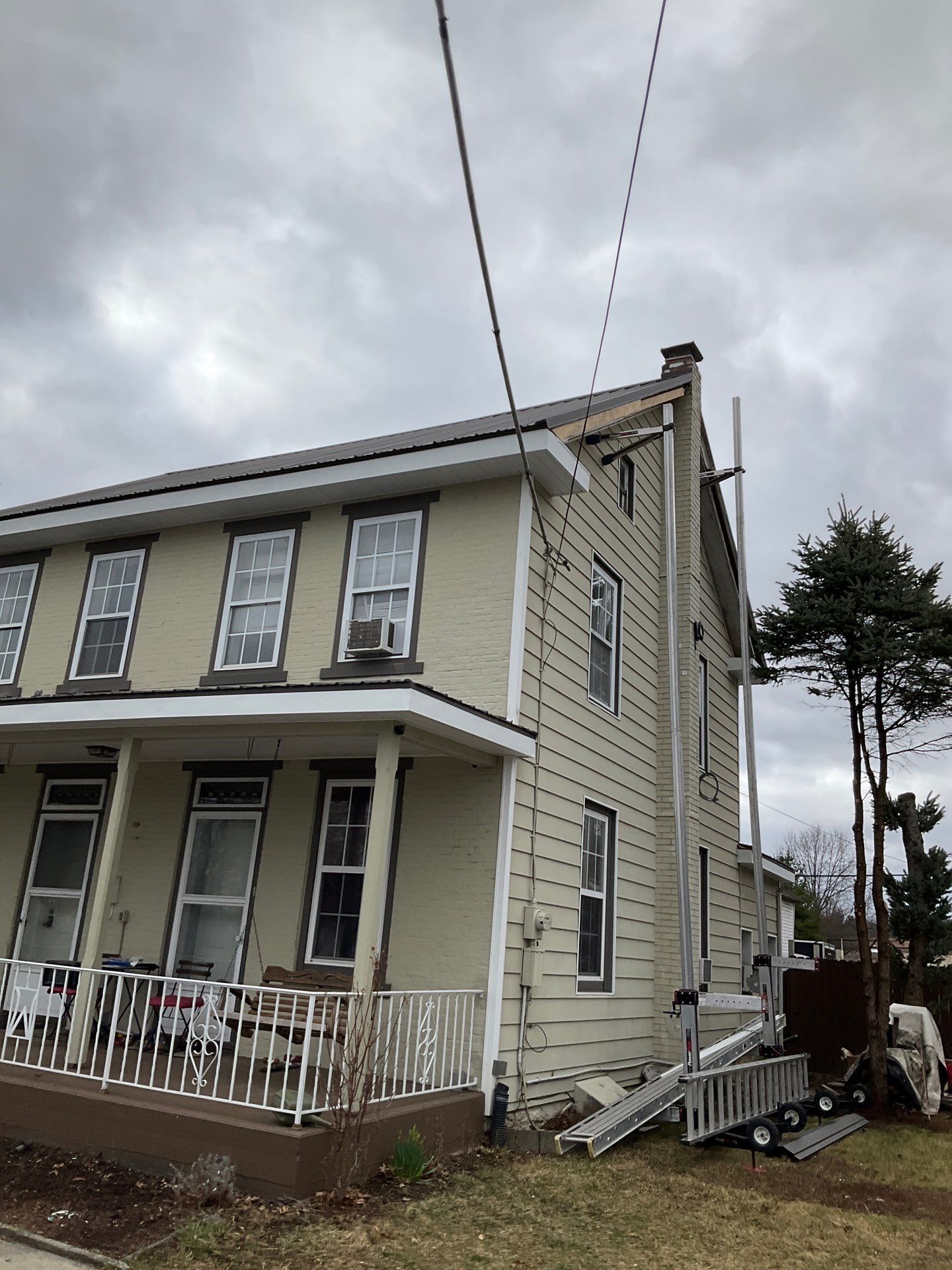Textured Bronze Roof and Flat Membrane Installation in Hershey by Esh Builders