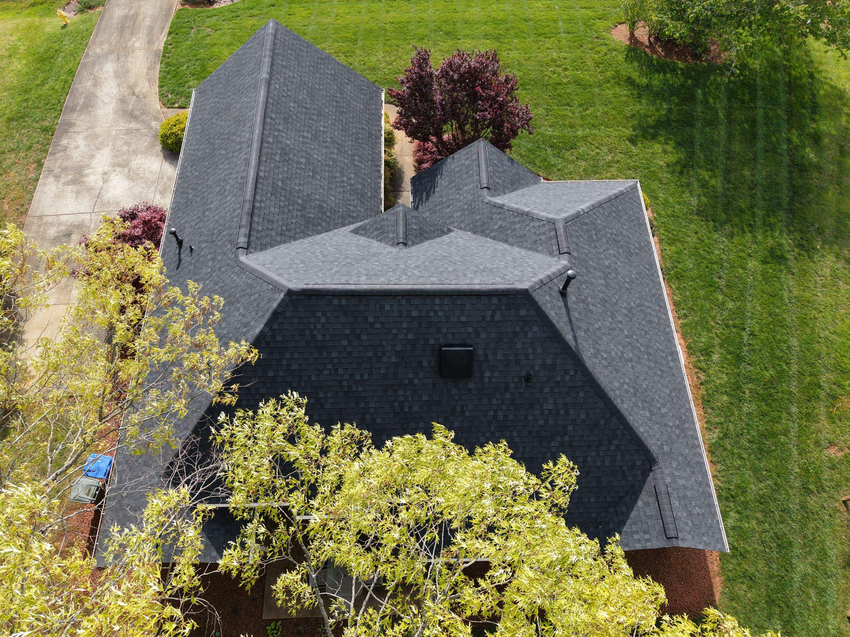 Residential Roofing Installation using TAMKO TITAN XT Rustic Black by RISE Roofing & Restoration, LLC