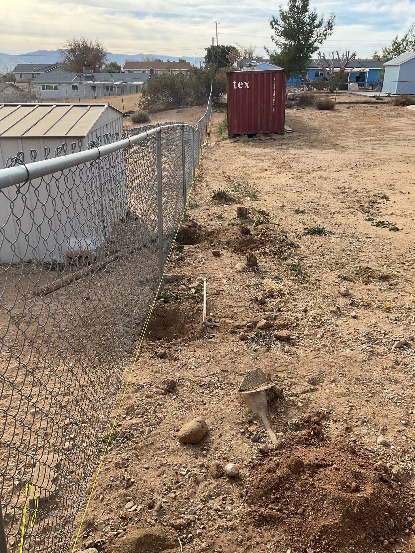 Fence Installation using vinyl and chain link  by Fence Guys Inc. 