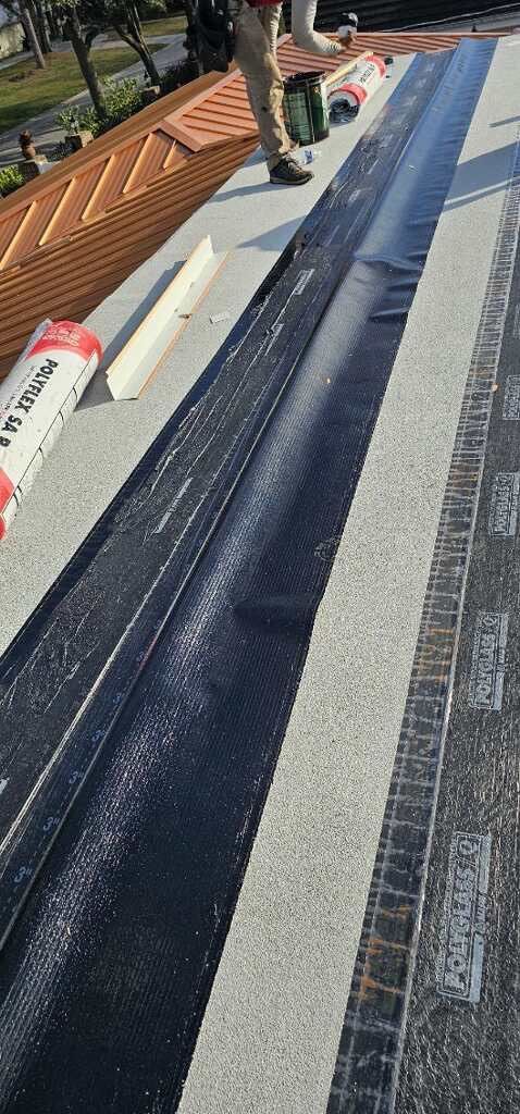 Residential Re-Roof using MS Metals, Copper Penny, Standing Seam. by First Due Roofing