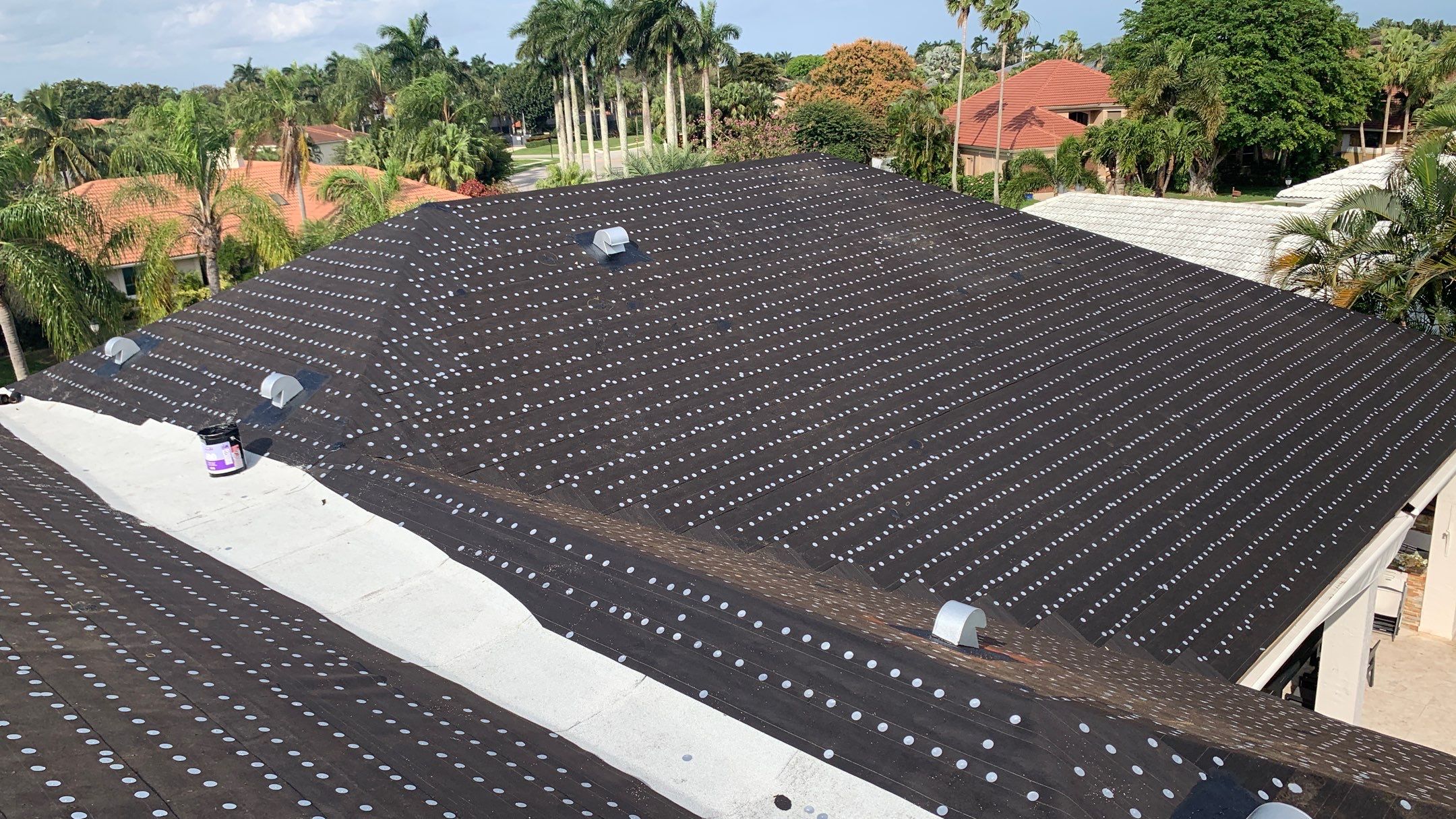 Residential Roofing Installation using 1" Nail strip metal roof by BLUES BROTHERS ROOFING