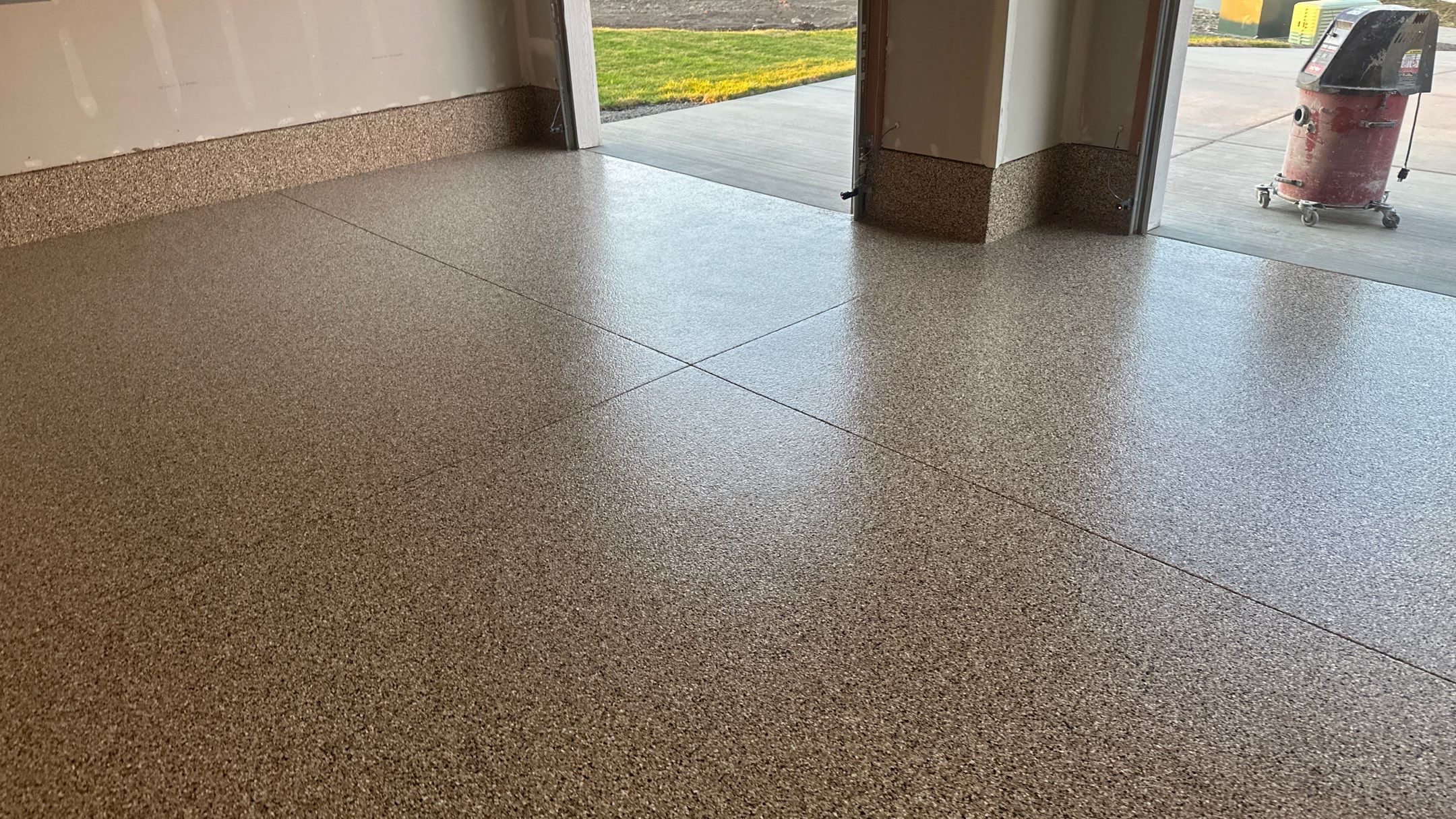 Garage Transformation using Sandstone by Croc Coatings, LLC