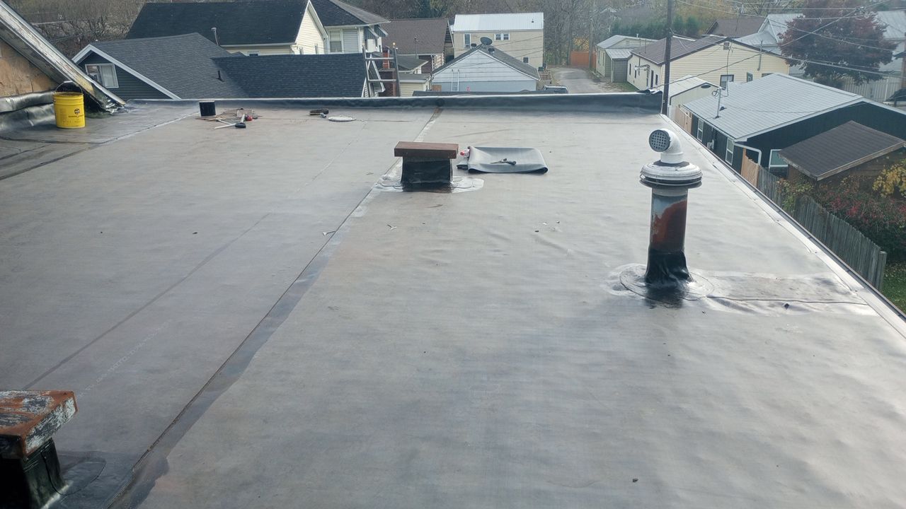 Commercial Roofing Installation using Performance Shingles by Mr. Roofer