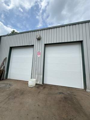 Commercial Door Installation using Clopay Modern Steel Garage Doors