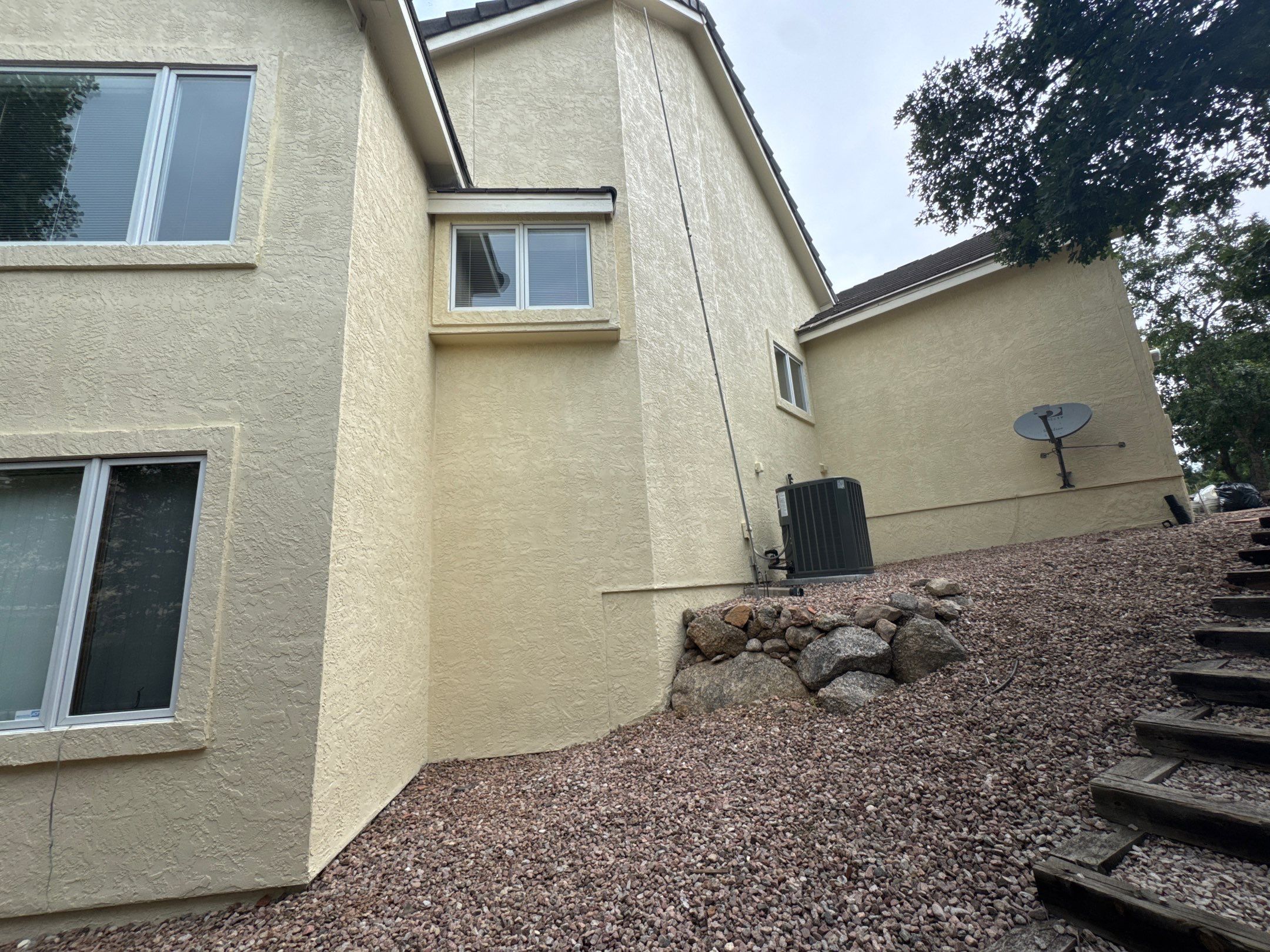 Exterior Stucco Repair and Elastomeric in the Broadmoor Bluffs by Carroll Painting LLC