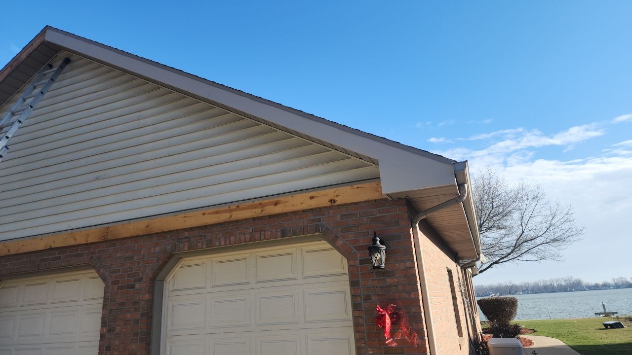 Residential fascia replacement using Clay trim coil by Nitro Roofing and Construction