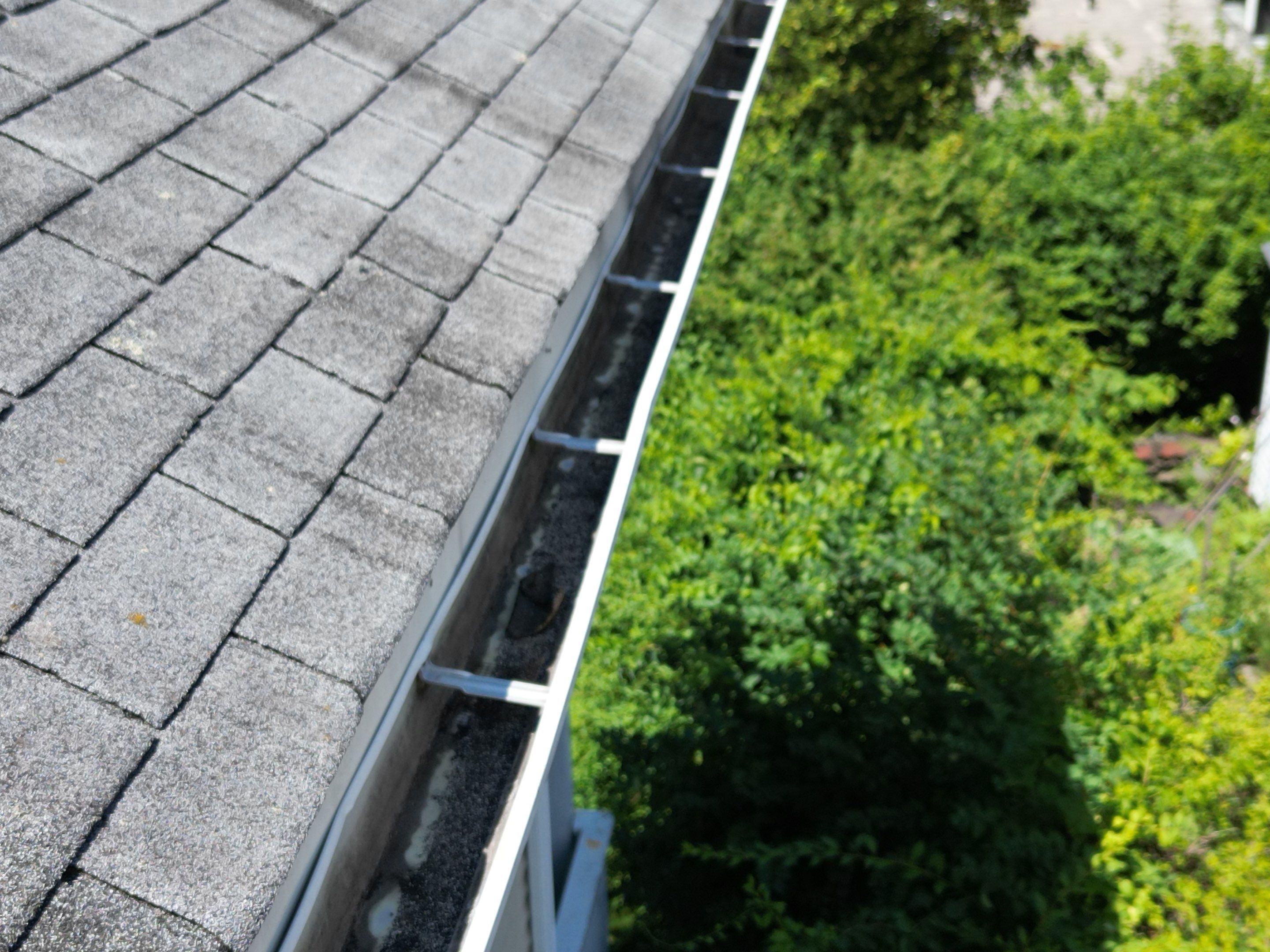 Roof Replacement with Skylight Flashing in Waltham, MA by Mighty Dog Roofing of Greater Middlesex County