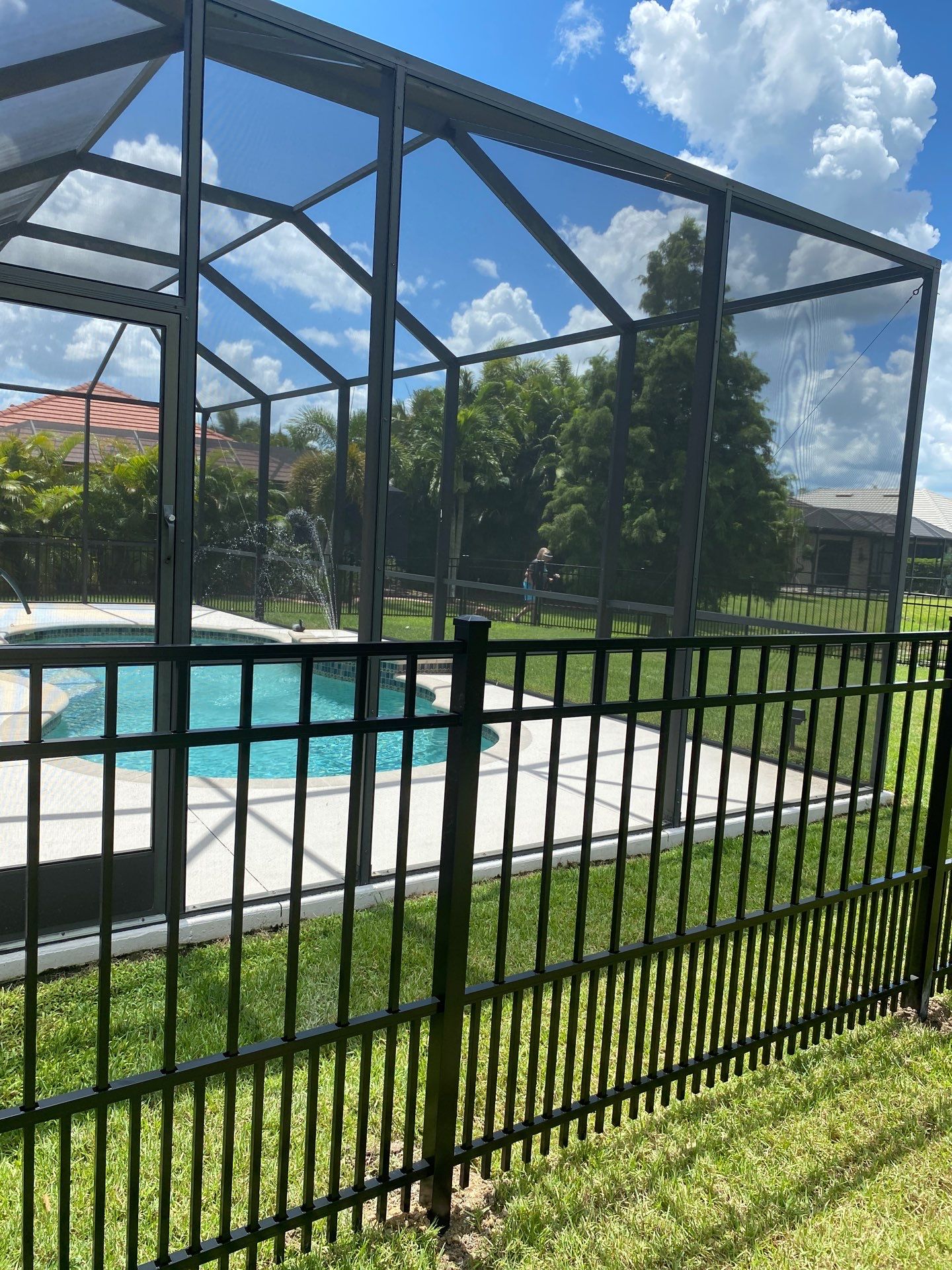 customer with puppy picket aluminum  by H&Y Fence