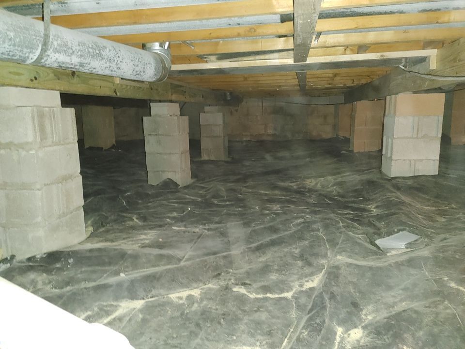 Crawl space encapsulation and Waterproofing using Structural Wood and Steel Reinforcements by Toledo Basement Repair 