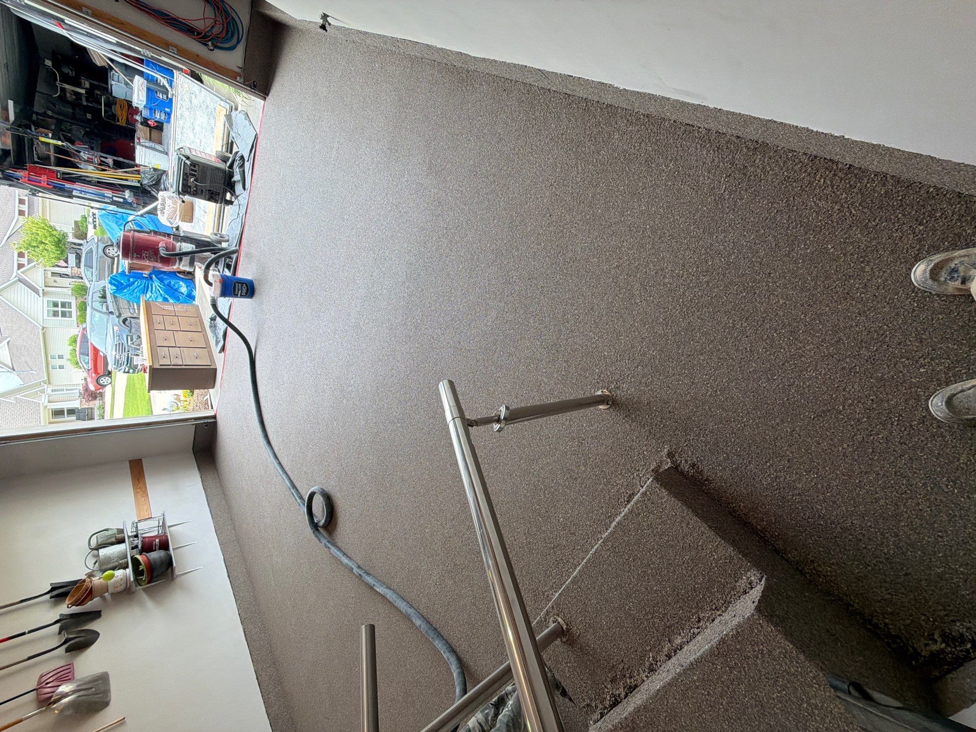 Garnet Polyaspartic Flake Garage Floor Installation in Zeeland by Gordon Painting
