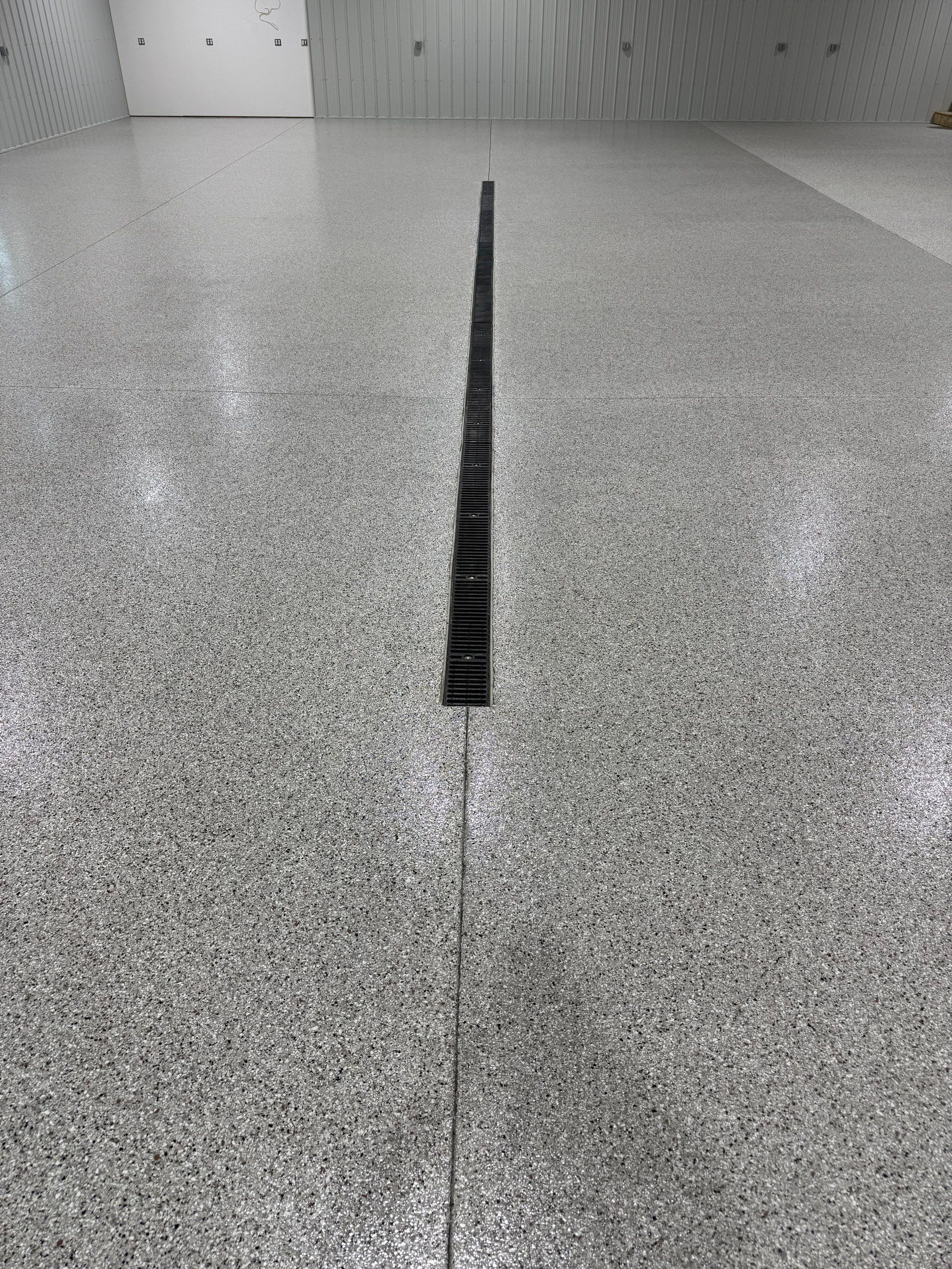 Custom Speckled Floor Coating for Large Montrose Shop by Select Painting, Coatings & Garage Cabinets