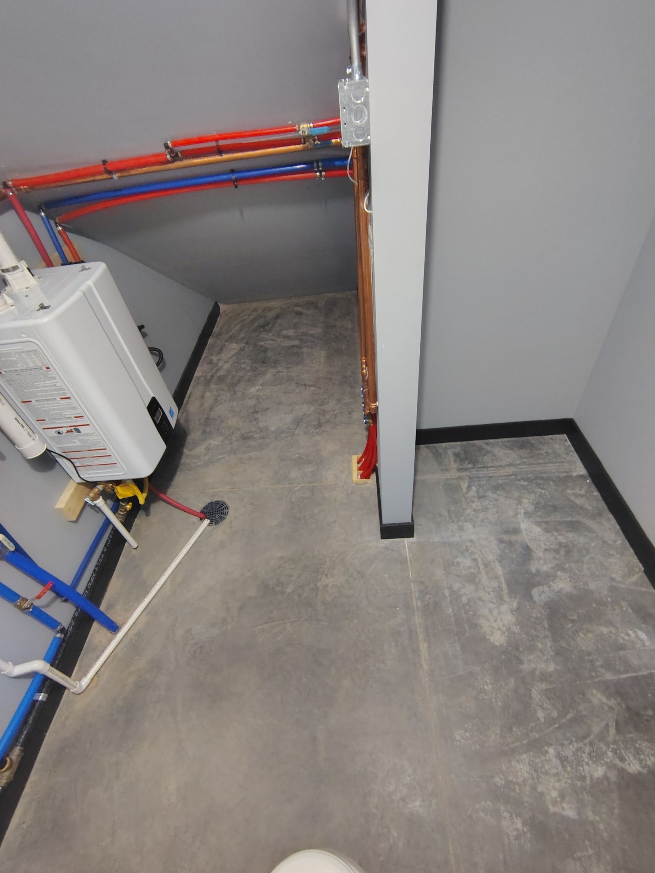 Polyaspartic Garage Floor Coating with Decorative Flake in Wentworth by Select Painting, Coatings & Garage Cabinets