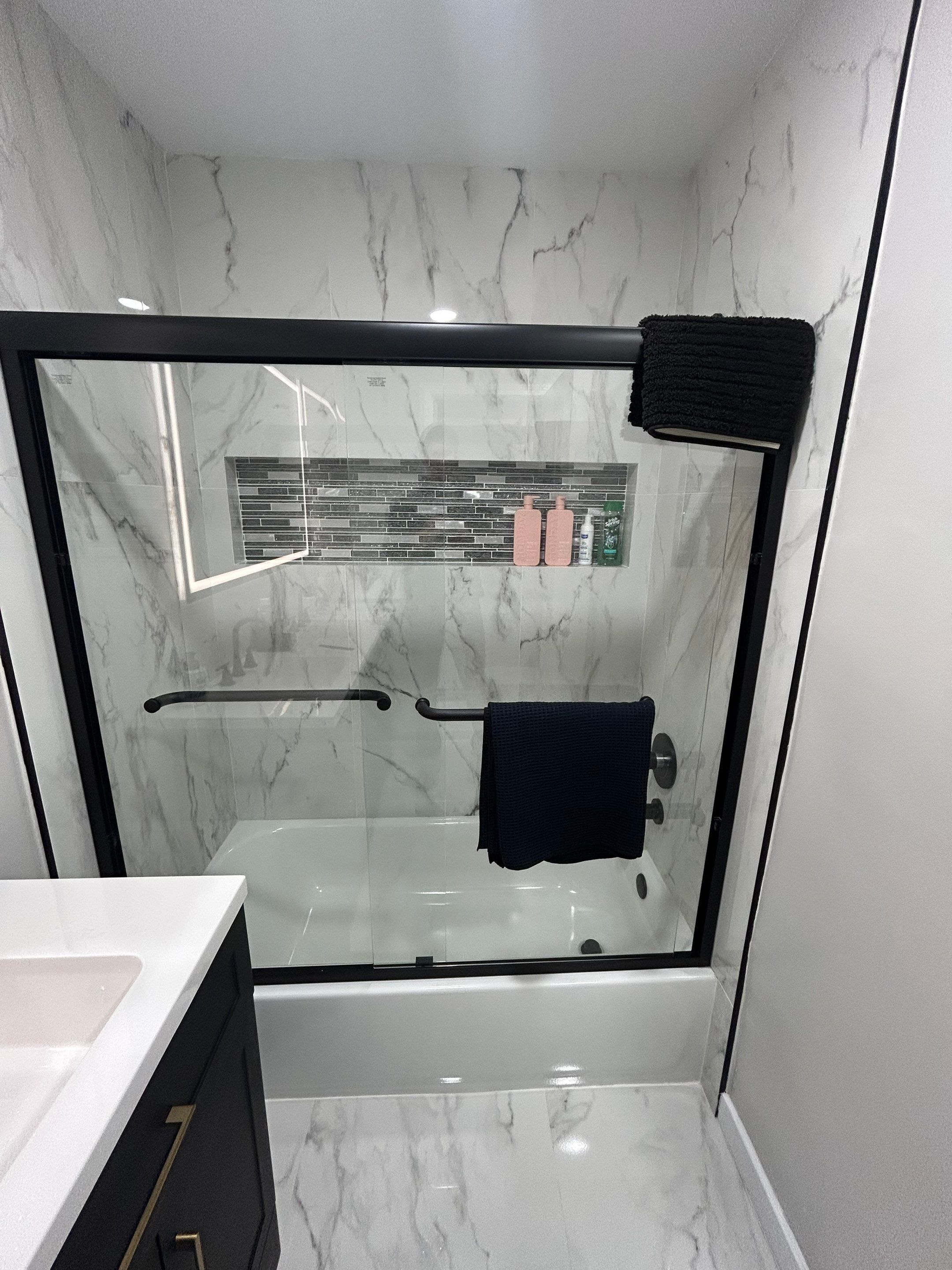 Master Bathroom, Children's Bathroom, and Fireplace Renovation by urban green energy llc