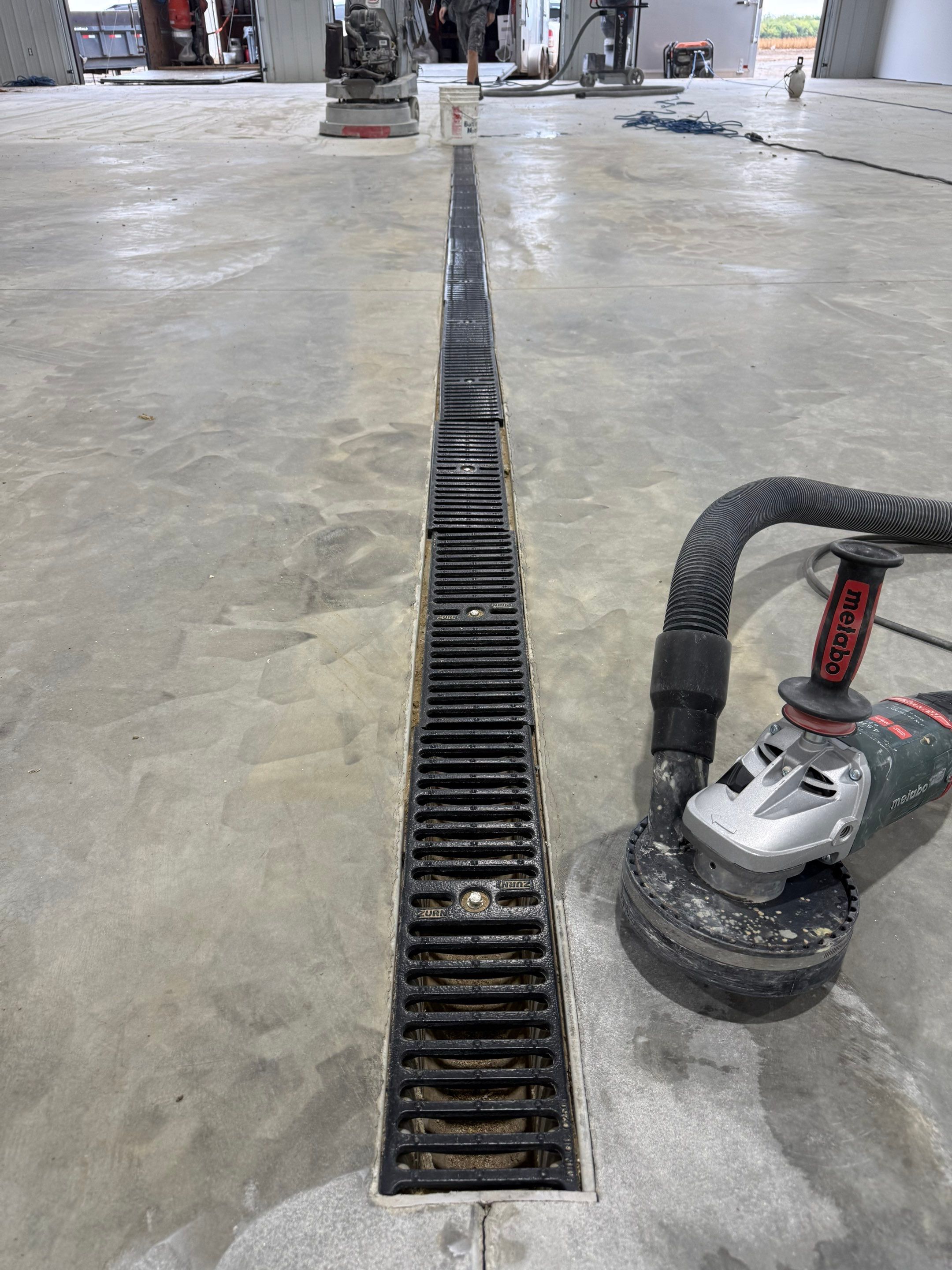 Custom Speckled Floor Coating for Large Montrose Shop by Select Painting, Coatings & Garage Cabinets