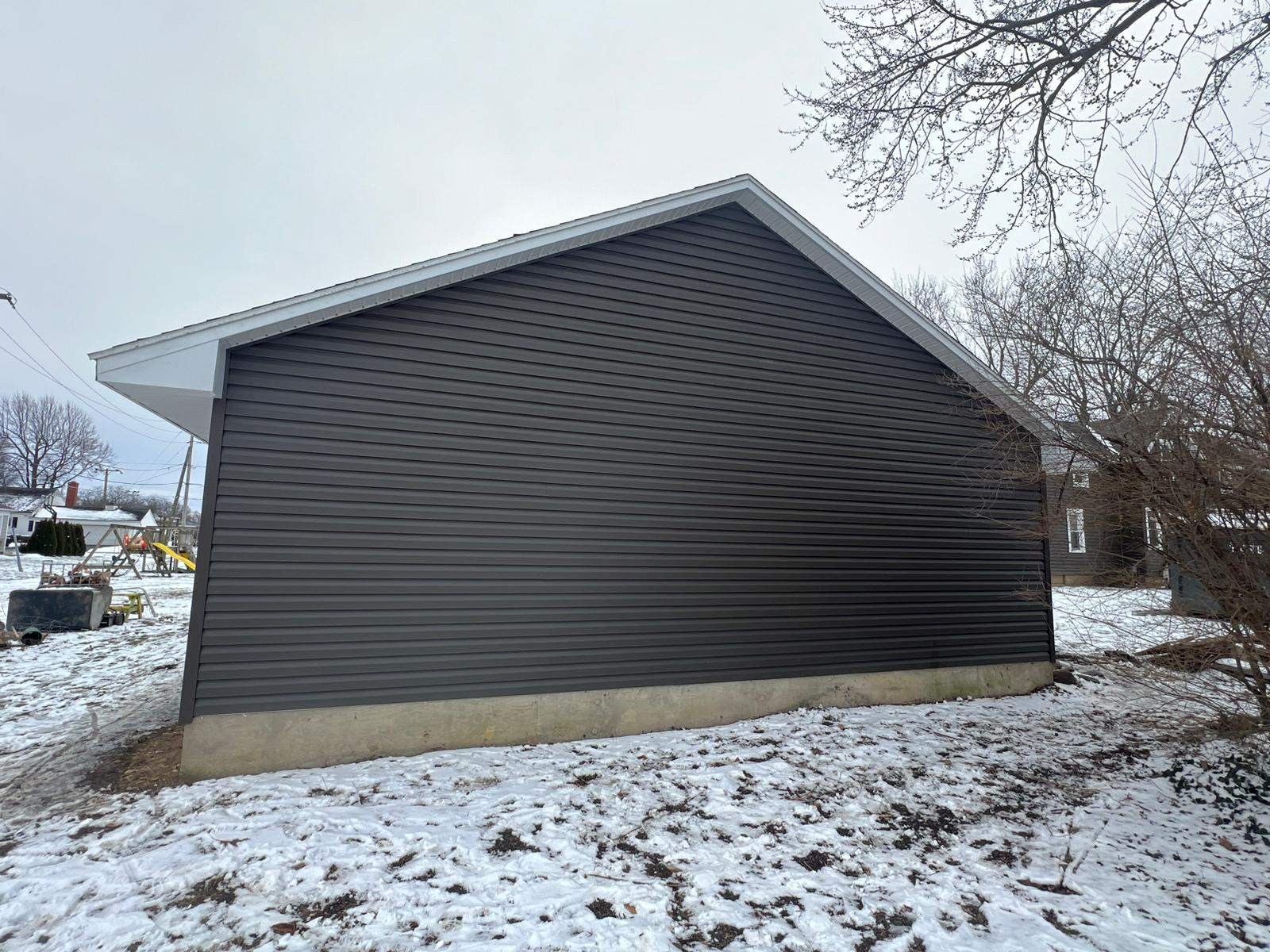 Residential fascia replacement using Exterior Portfolio 4.5 DL - Peppercorn by Nitro Roofing and Construction