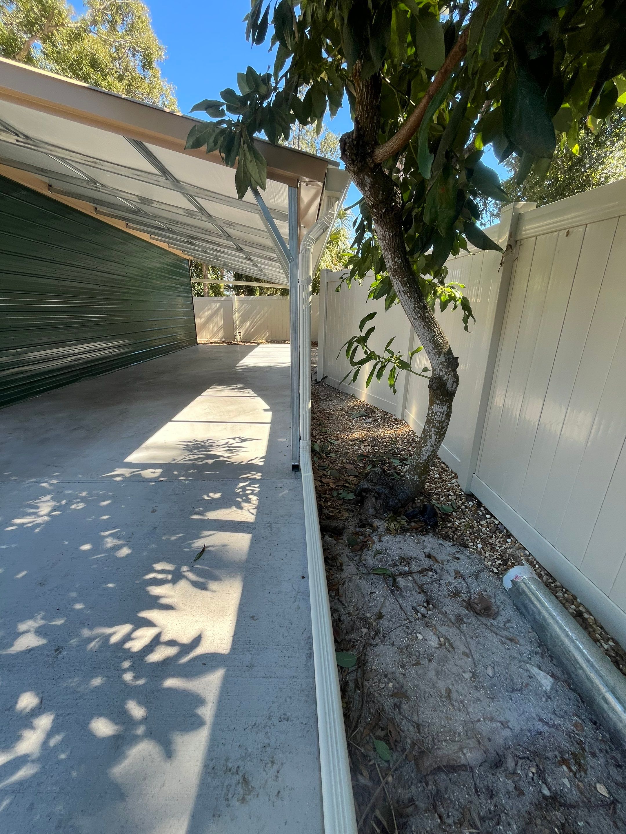 White 6-inch K-style Gutters and Down Spouts using Seamless Gutters White Down Spouts in Tampa FL by Gutter Professors