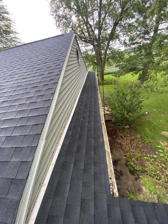 Storm damage roof replacement by Nitro Roofing and Construction
