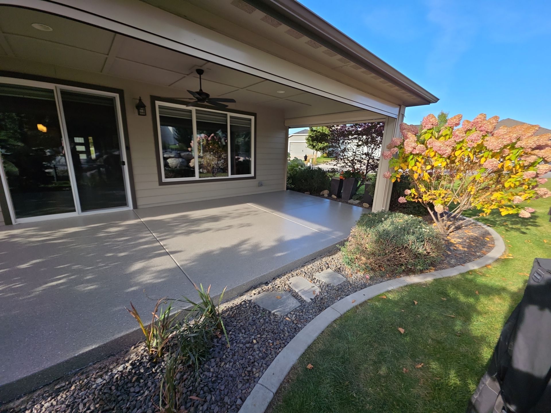 Front Porch and Back Patio Concrete Transformation in Liberty Lake by Croc Coatings, LLC