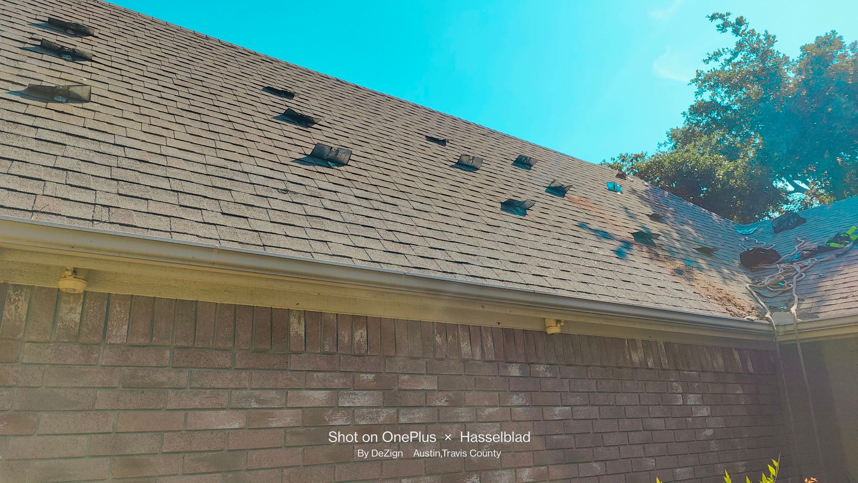 Residential Roofing Installation using IKO Dynasty Class 3 IR Granite Black by DeZign Roofing & Exteriors