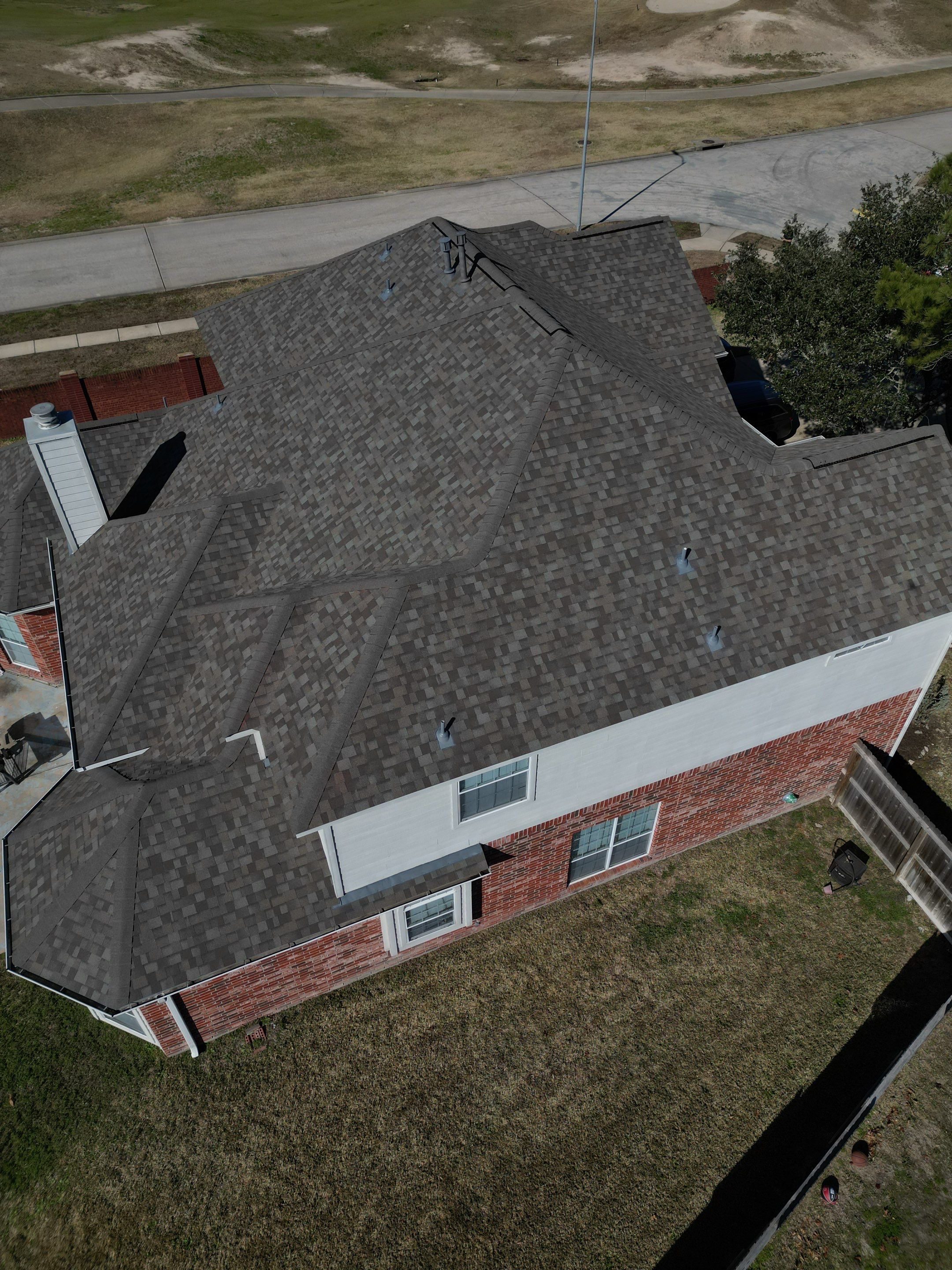 OC Duration Driftwood by HHH Roofing & Construction