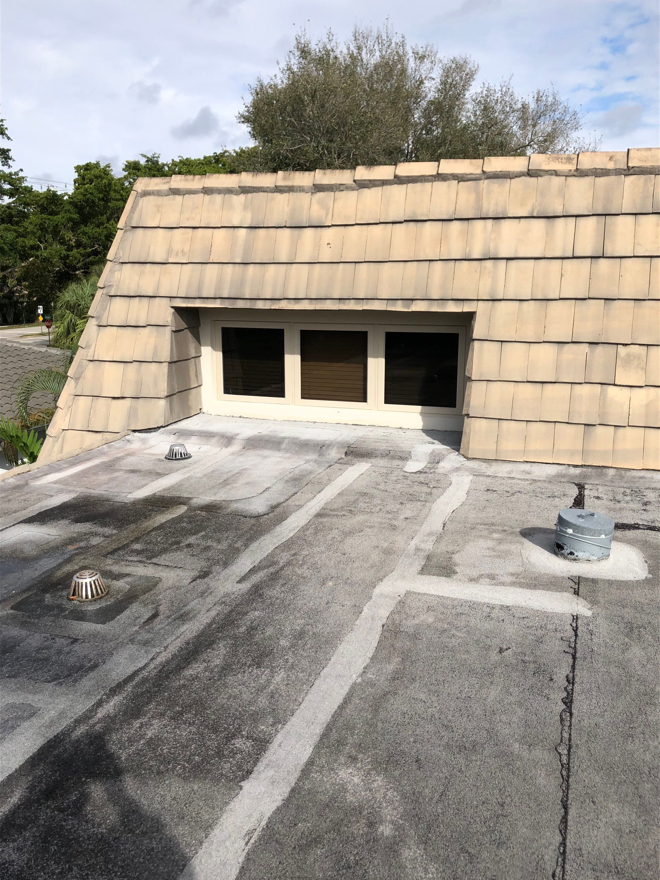 Amazing TPO flat deck re-roof with Eagle mansard in Hollywood Florida.  by First Due Roofing