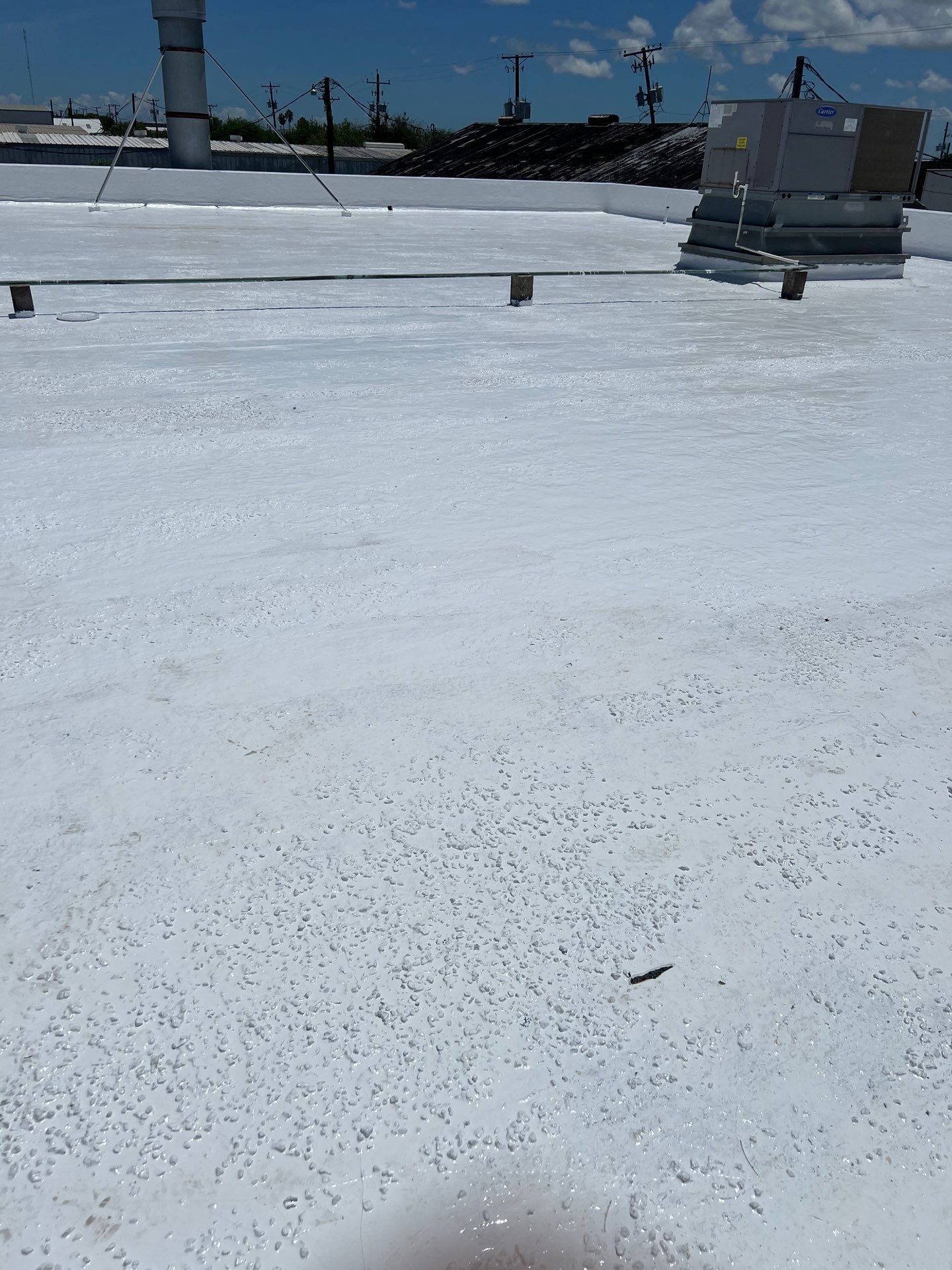 Dirty leaking Gravel Roof by Bayfront Roofing and Construction