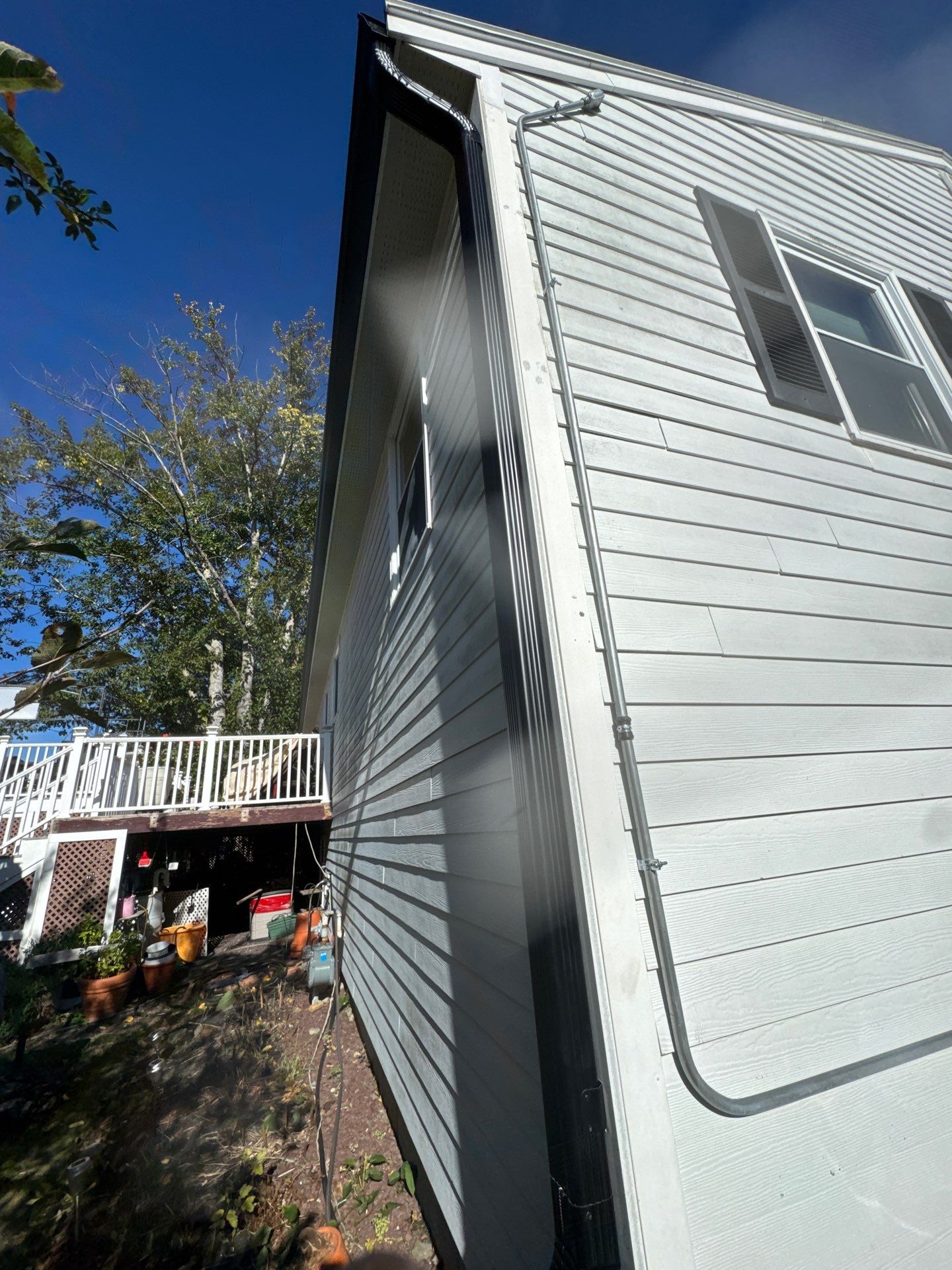 Seamless Black Gutter & Fascia Upgrade | Methuen, MA by Mighty Dog Roofing of Greater Middlesex County