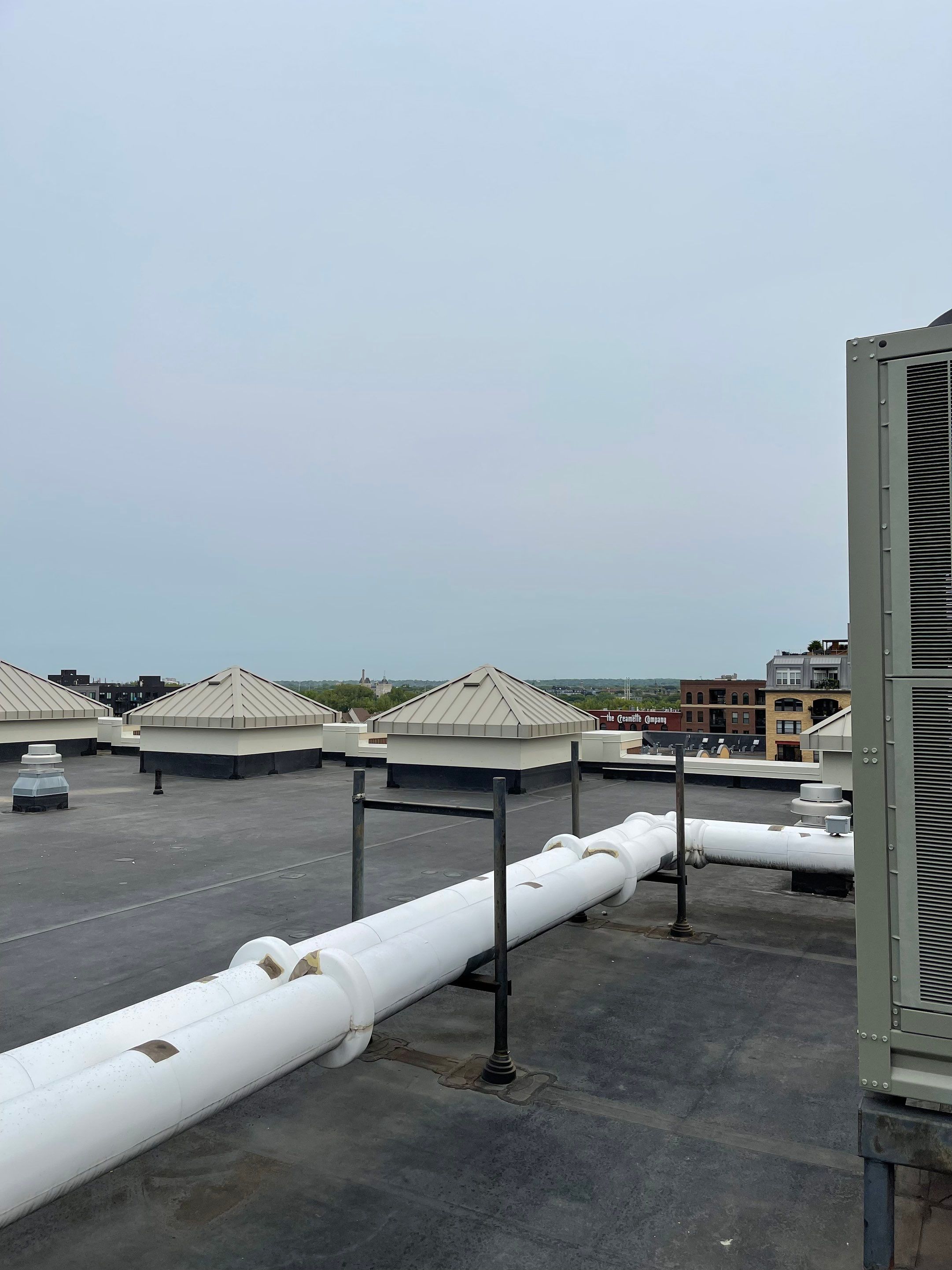 Rubber Roof Replacement - Minneapolis, MN by Gassen Construction and Maintenance