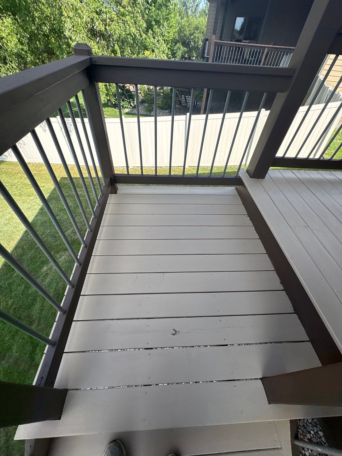 Sioux Falls Exterior Refresh and Multi-Level Deck Maintenance by Select Painting, Coatings & Garage Cabinets