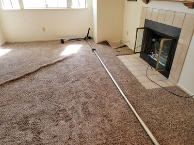 Post Water-Damage, Carpet Re-stretch & Clean