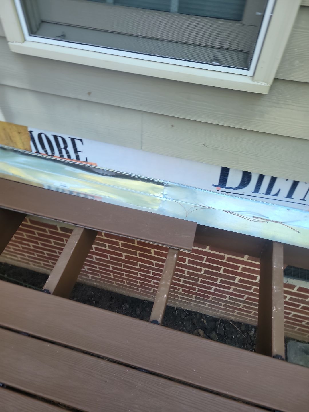 Fuquay-Varina Outdoor Upgrade – Composite Deck & Paved Landing by Elite Remodeling and Design LLC
