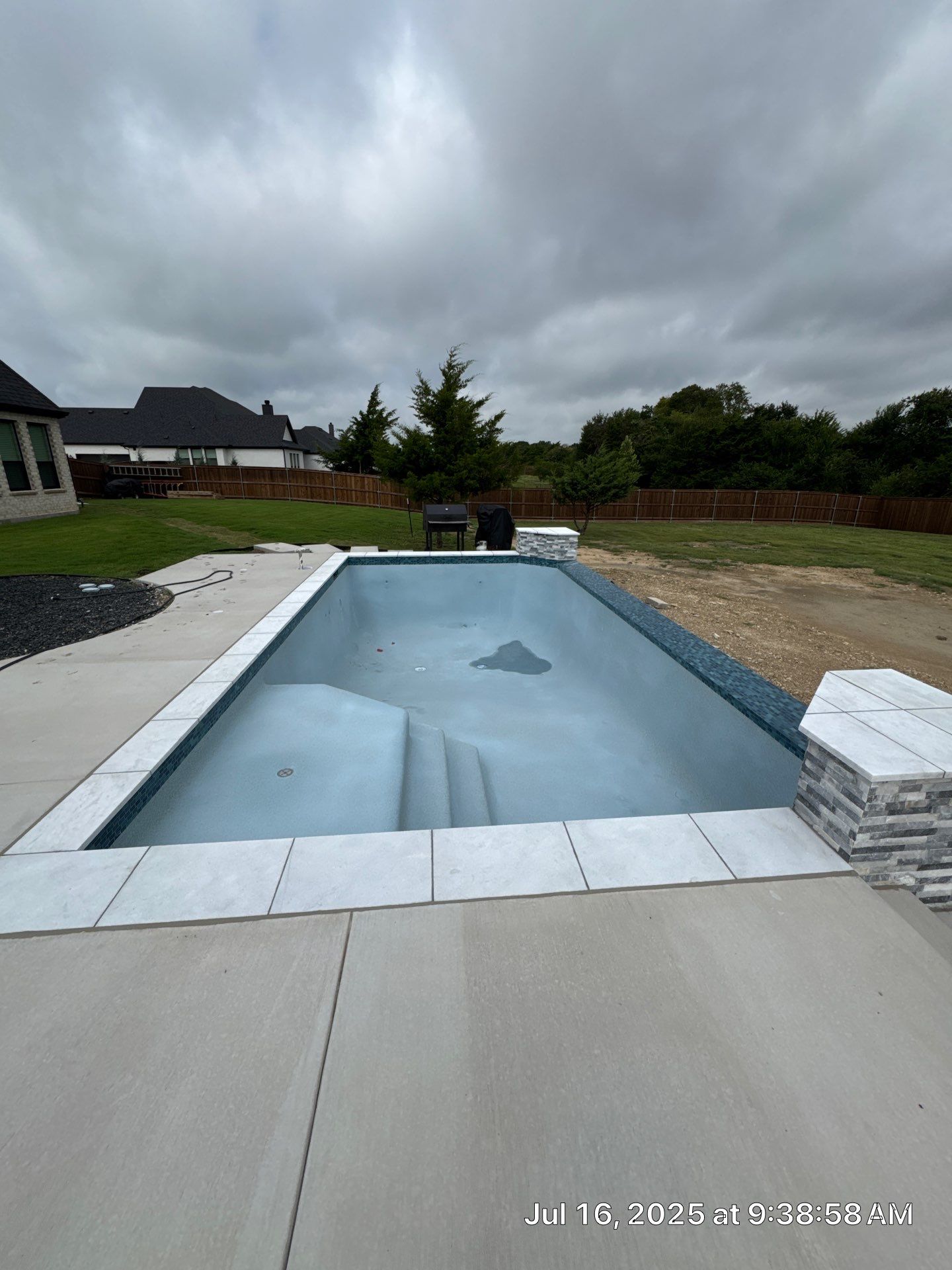 Modern Rectangular Pool with Sheer Waterfall by Pinnacle Pools and Spas - DFW