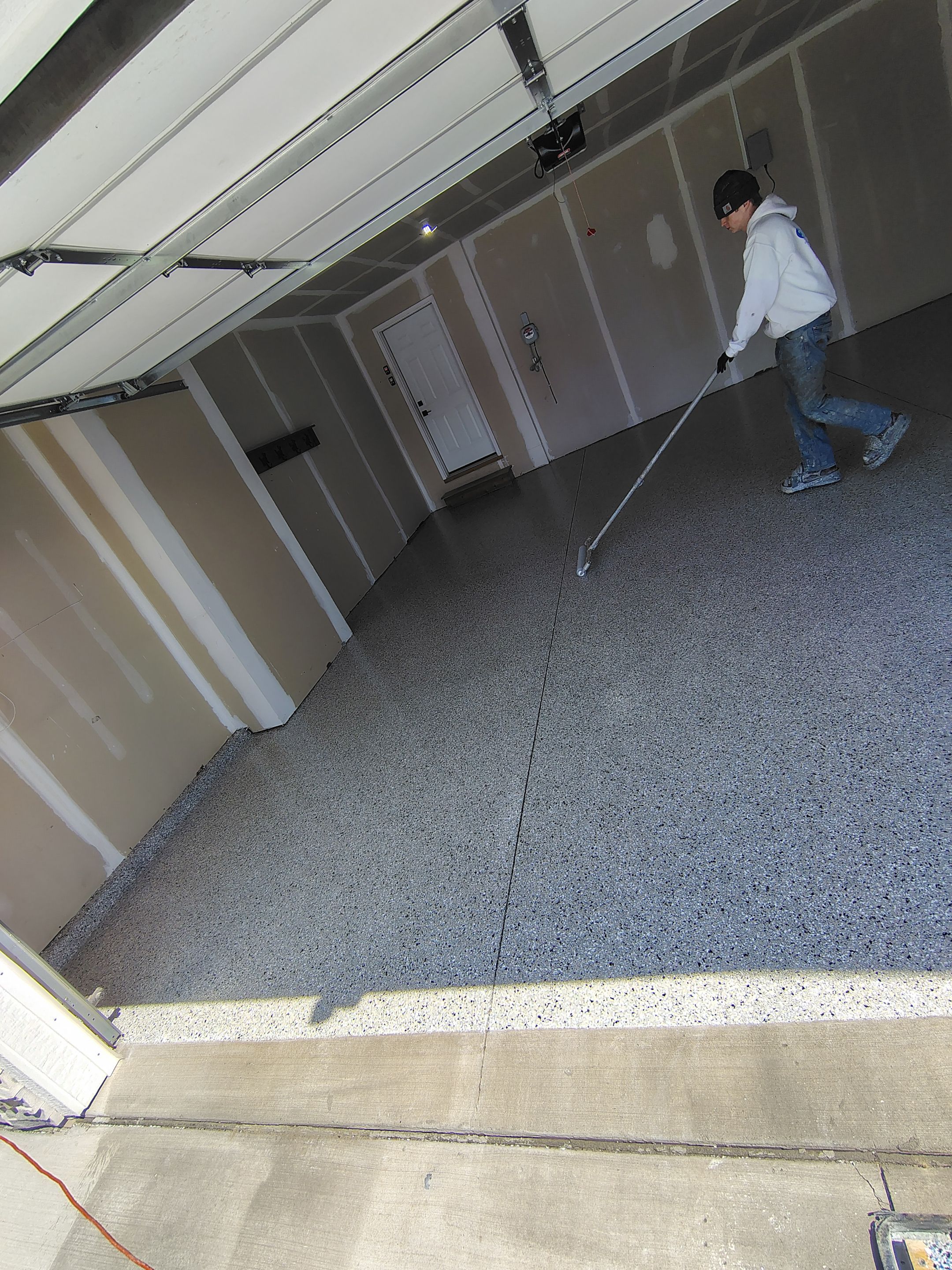 Epoxy Garage Floor Coating with Decorative Flake in Harrisburg by Select Painting, Coatings & Garage Cabinets